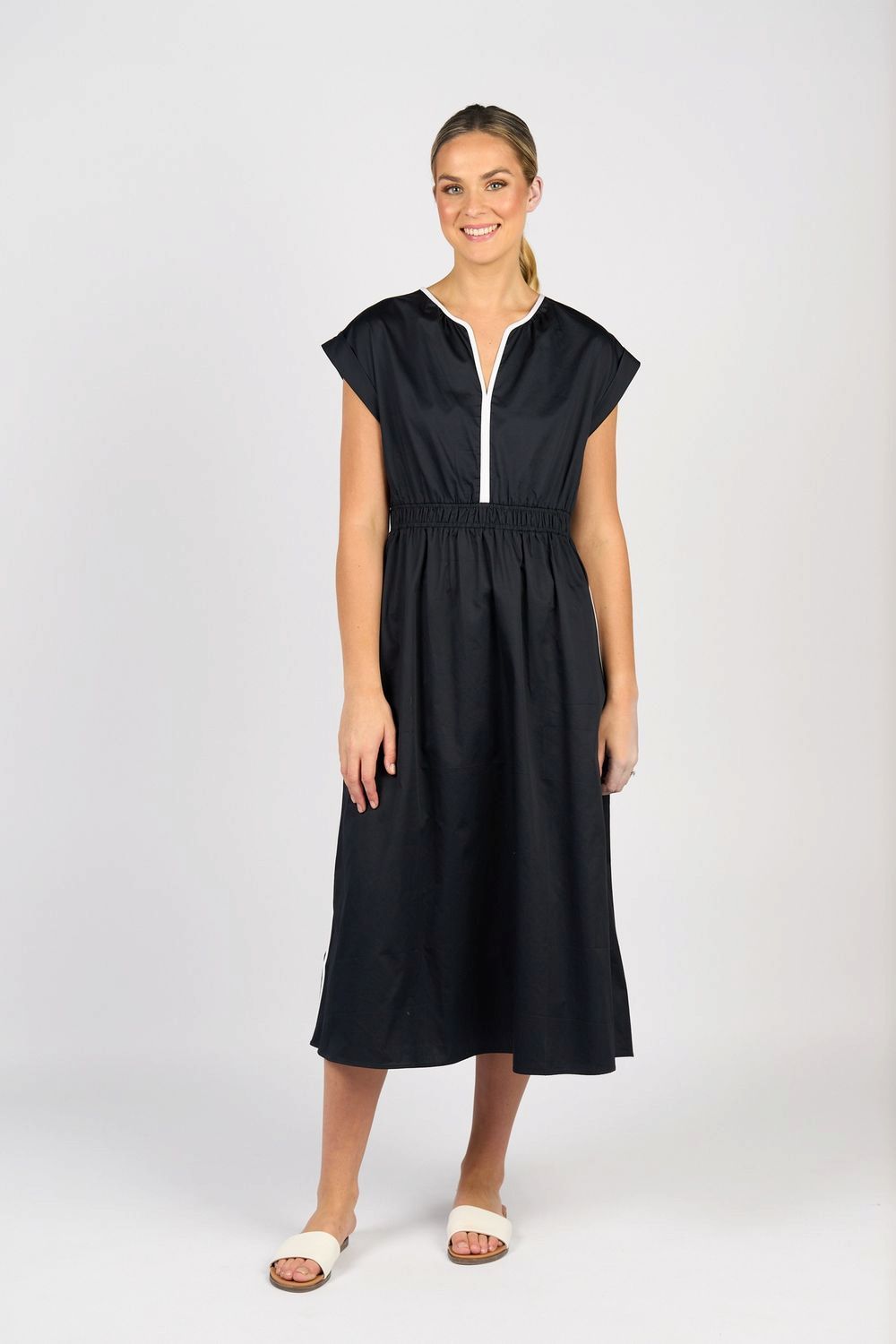 Woman in a Navy Dress With White Zipper, and Elastic Waist — Onyx Poppy Boutique in Buderim, QLD