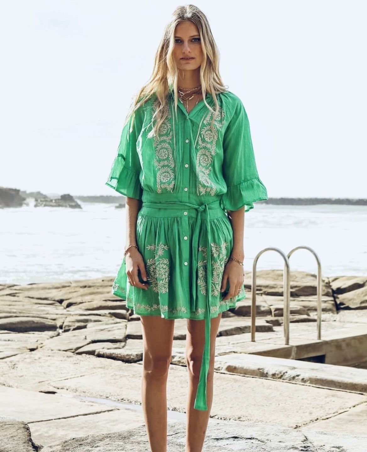 A Woman is Standing on a Beach — Onyx Poppy Boutique Buderim in Buderim, QLD