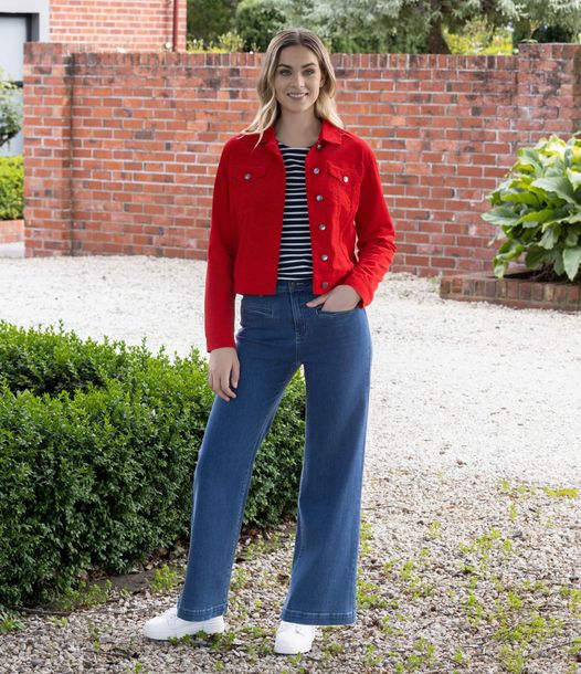 A Woman is Wearing a Paisley Jacket and White Jeans — Onyx Poppy Boutique Buderim in Buderim, QLD