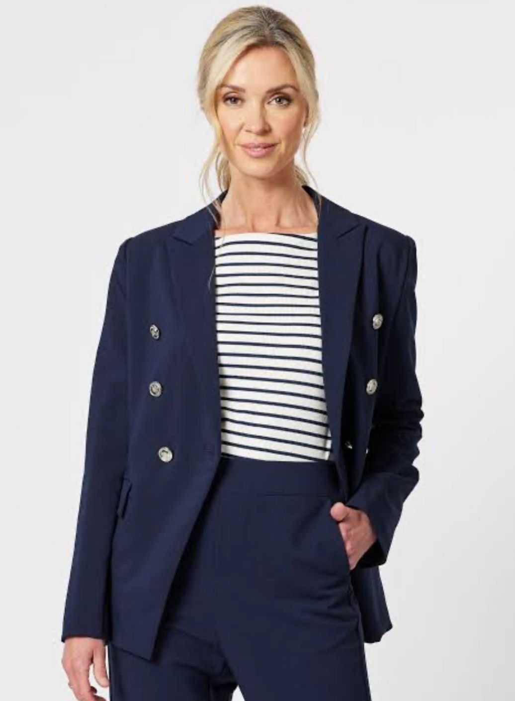 A Woman Wearing a Striped Shirt and a Blue Suit Jacket — Onyx Poppy Boutique in Buderim, QLD