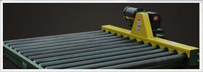 Chain Driven Conveyors — Yellow Chain Driven Conveyors In Shipping Area In Fort Worth, Tx