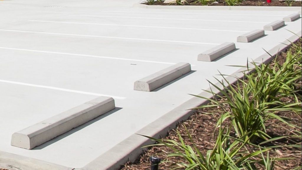 A Parking lot with Blocks on the side of the road — Precast Concrete Solutions in Queanbeyan East, NSW