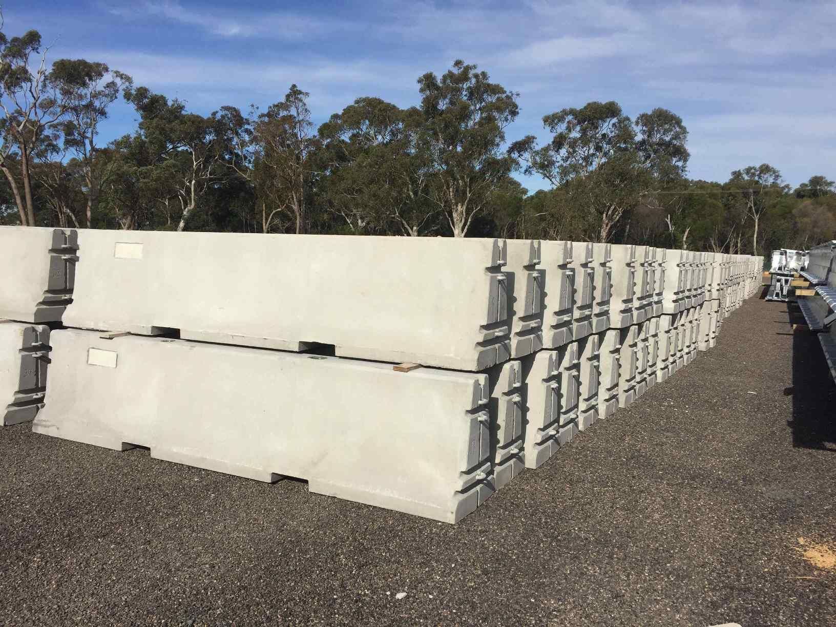 Parapets For Bridges In A Field With Trees Behind Them — Precast Concrete Solutions in Queanbeyan East, NSW