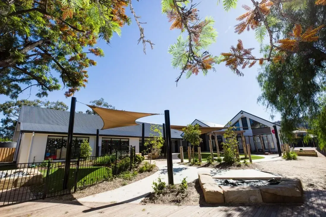 A Large Building with A Lot of Trees in Front of It — D&C Projects in Dungog, NSW