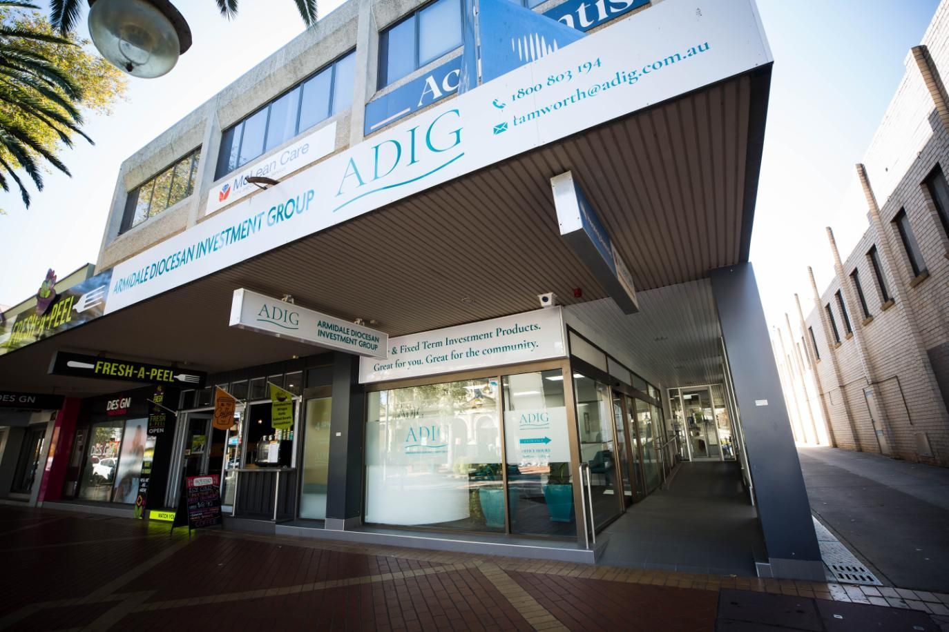 A Building with A Sign that Says Adig on It — D&C Projects in Tamworth, NSW
