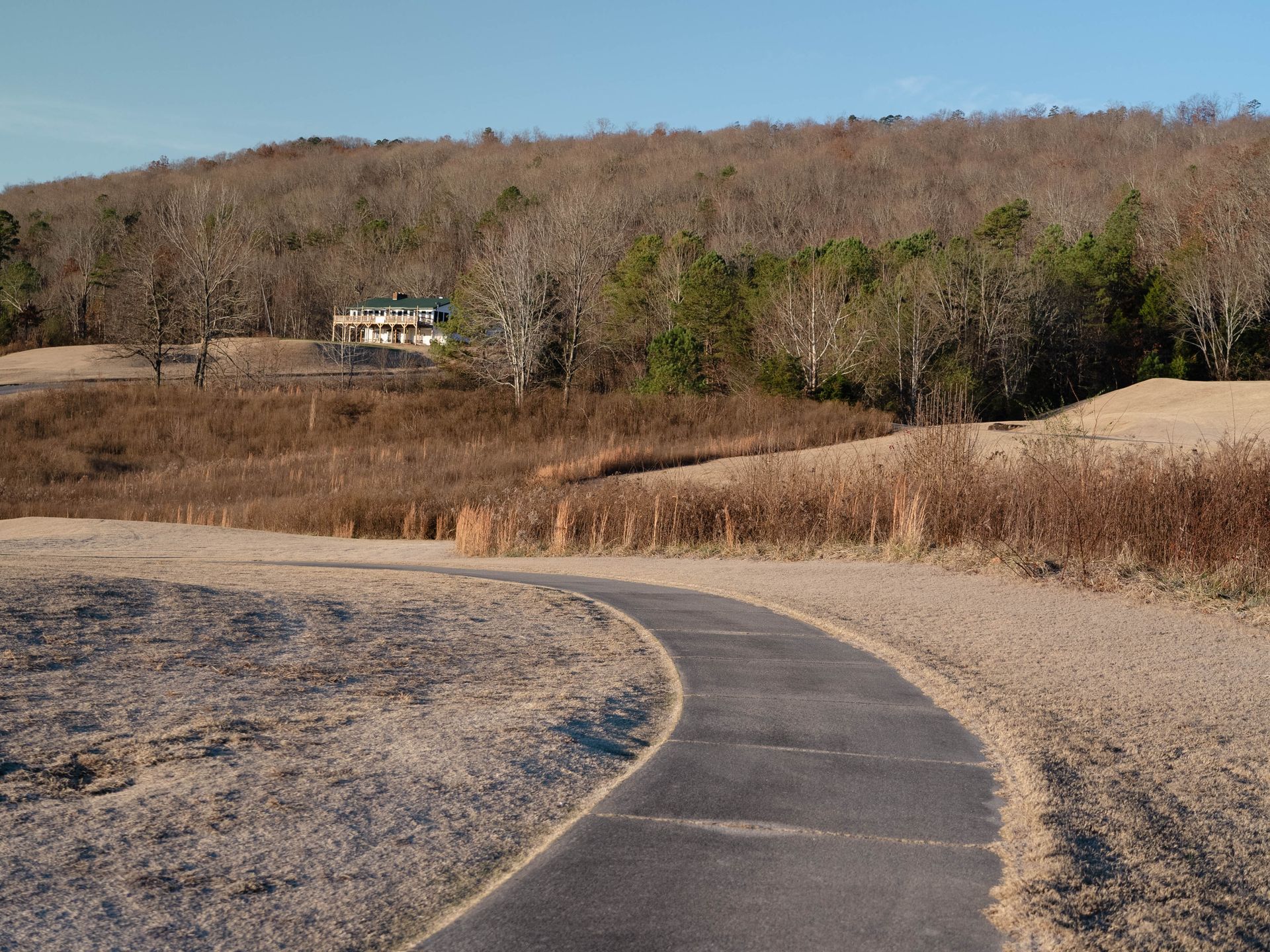 Pathway near houses up to Trenton golf course project in Trenton Georgia