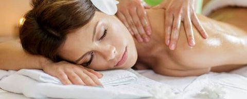 Woman Receiving Back Massage — Massage Therapy in Edina, MN