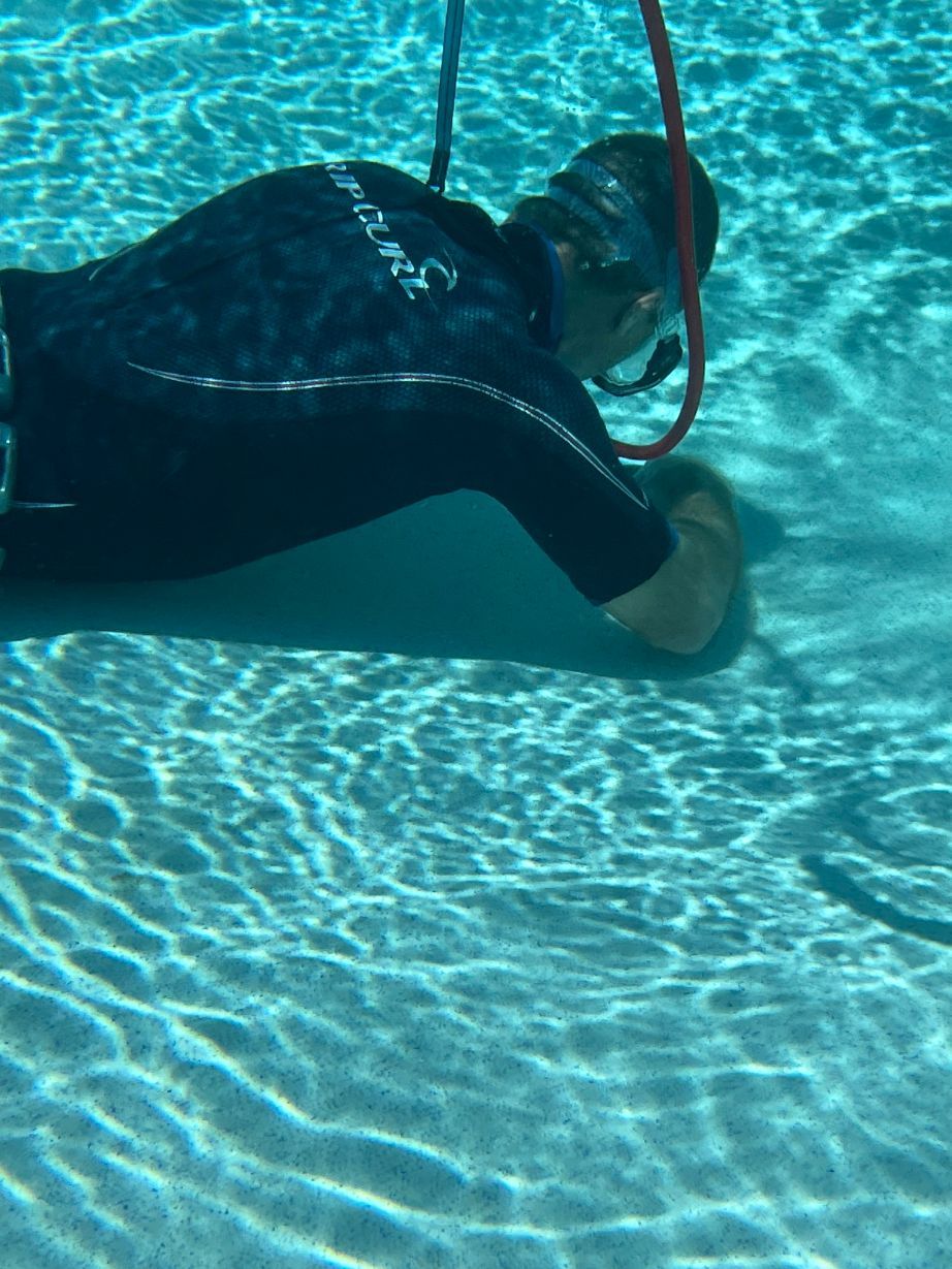 Expert Man Detecting Leak Under Water — Leak Detection & Swimming Pool Repairs in Ballina, NSW