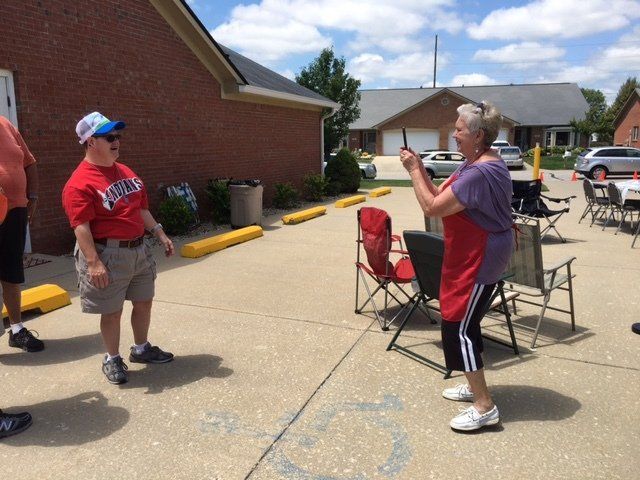 A man in a red shirt that says ' jacksonville ' on it