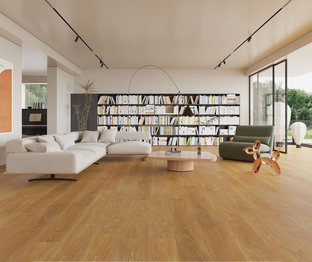 Spacious Living Room With Light Wood Floors, and a White Sectional Sofa — AGM Flooring & Tiling in Hidden Valley, QLD