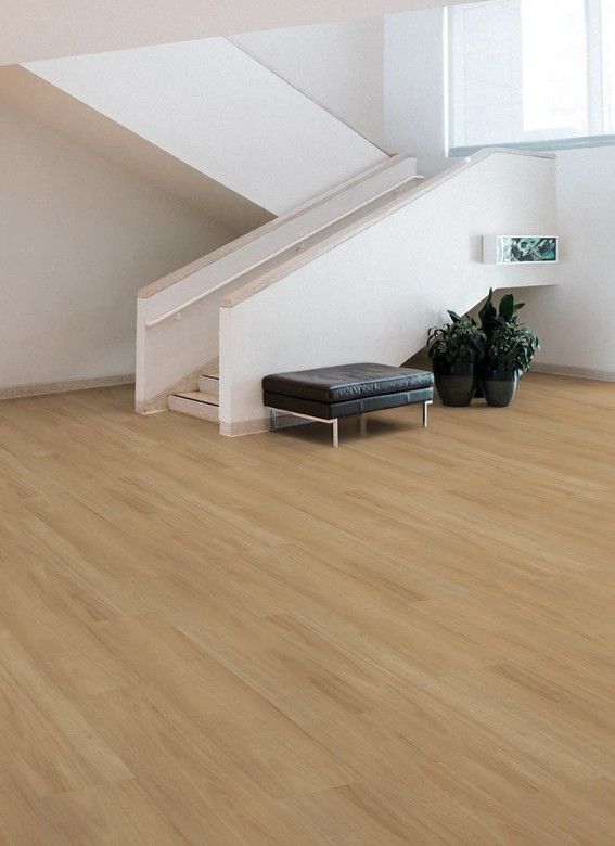 A Light Wood-floored Entryway With a Staircase — AGM Flooring & Tiling in Hidden Valley, QLD