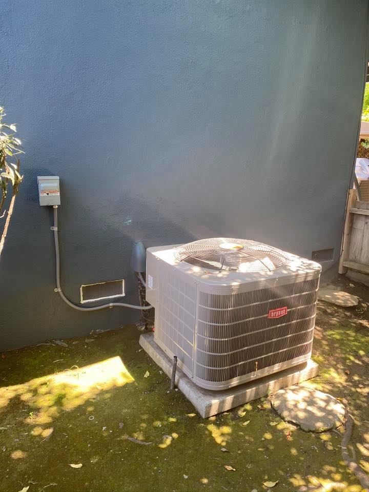 Air conditioning maintenance and repair with Bryant outdoor AC system
