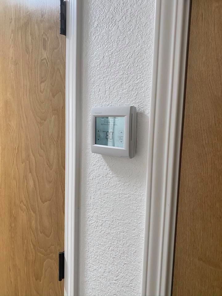 Air conditioning thermostat replacement with modern programmable thermostat for HVAC system
