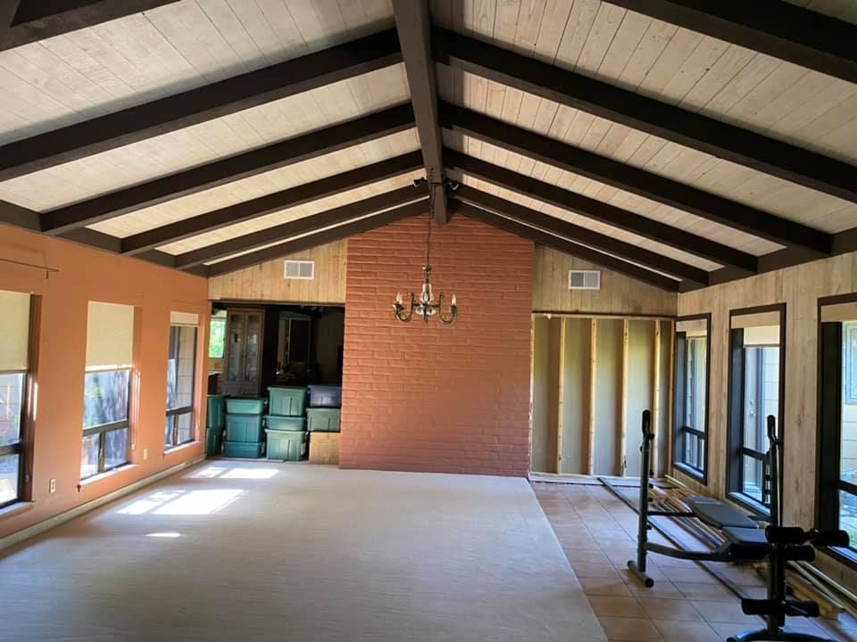 Interior room with new HVAC ceiling vents for improved air duct system in house
