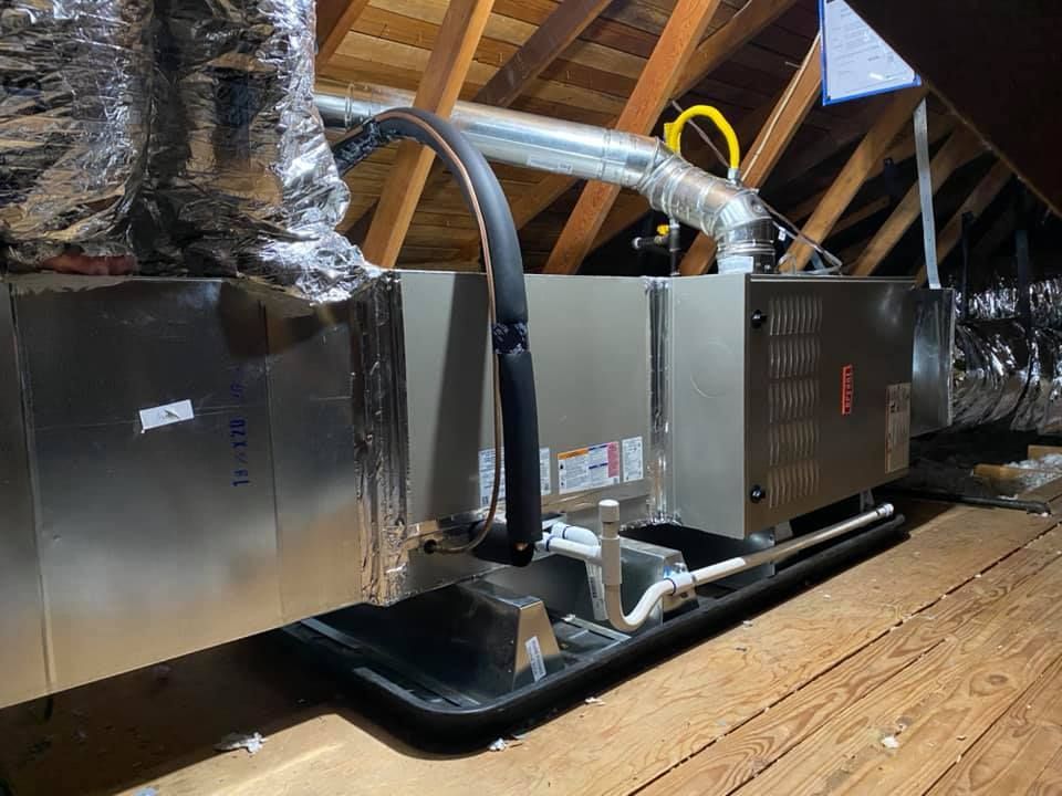 Attic HVAC system with insulated ductwork installation and furnace air ducts
