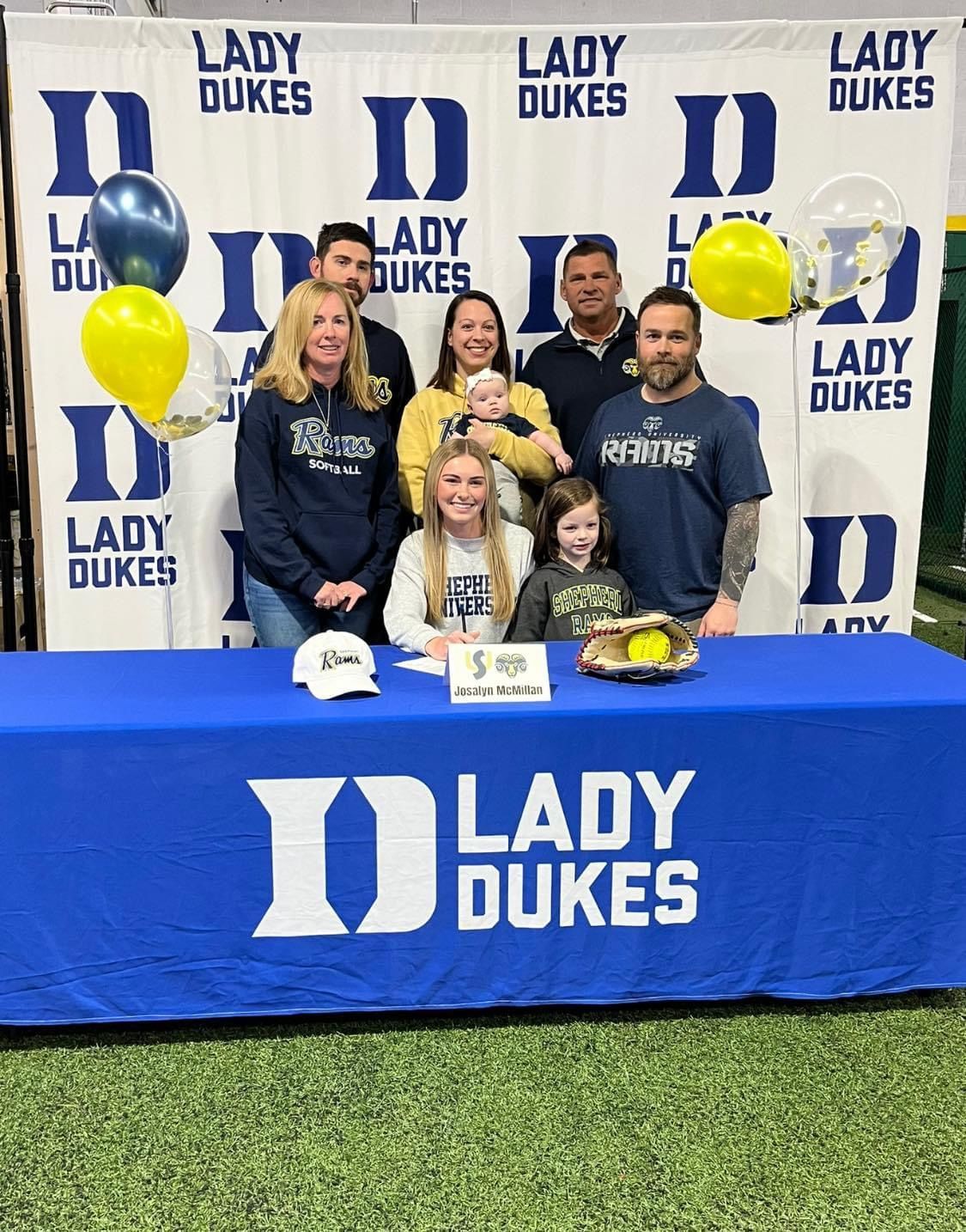 A woman is signing a letter of intent for the Lady Dukes softball team — Elkton, MD — Maryland Legends Baseball