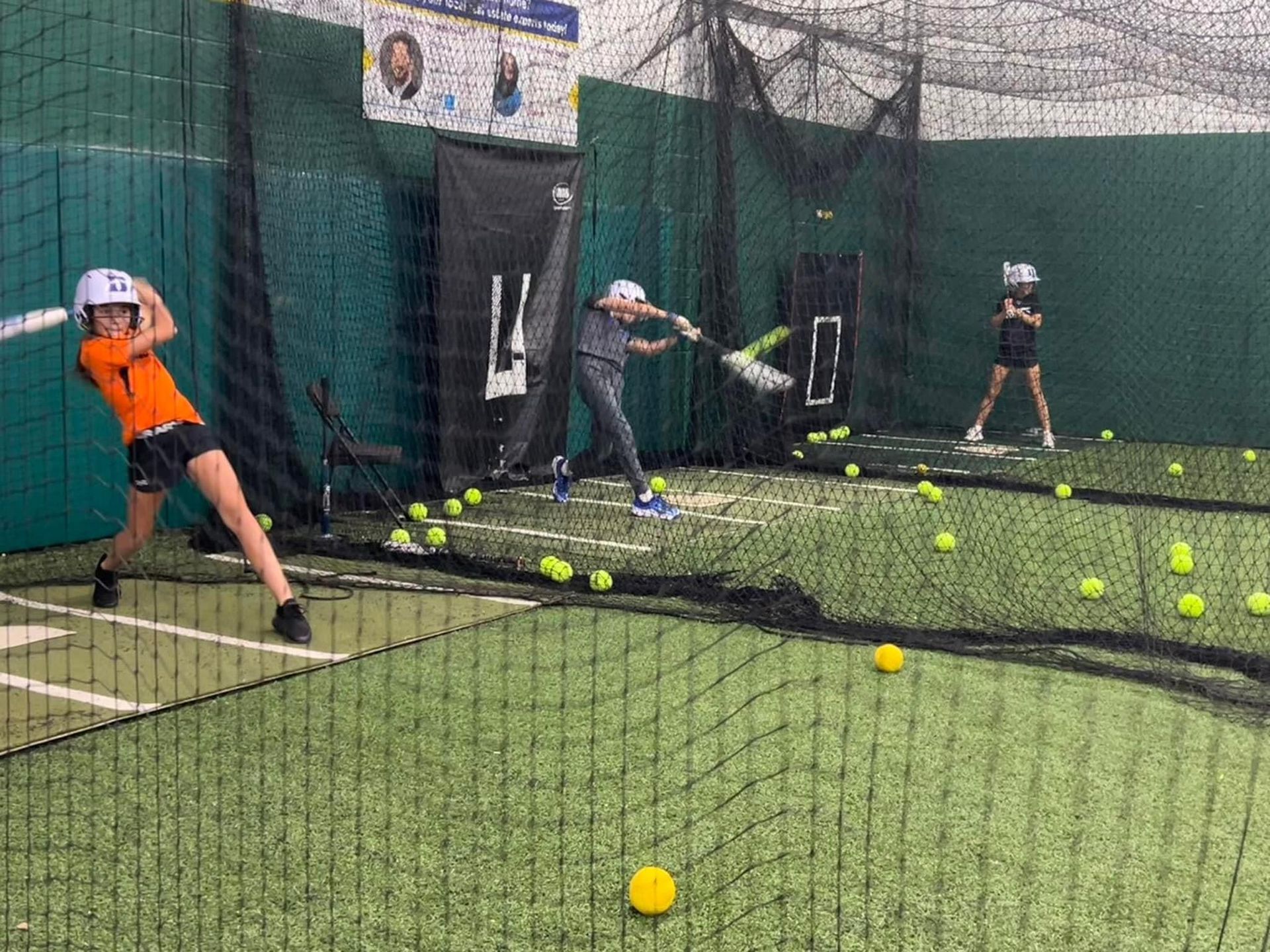 A group of children are playing softball — Elkton, MD — Maryland Legends Baseball