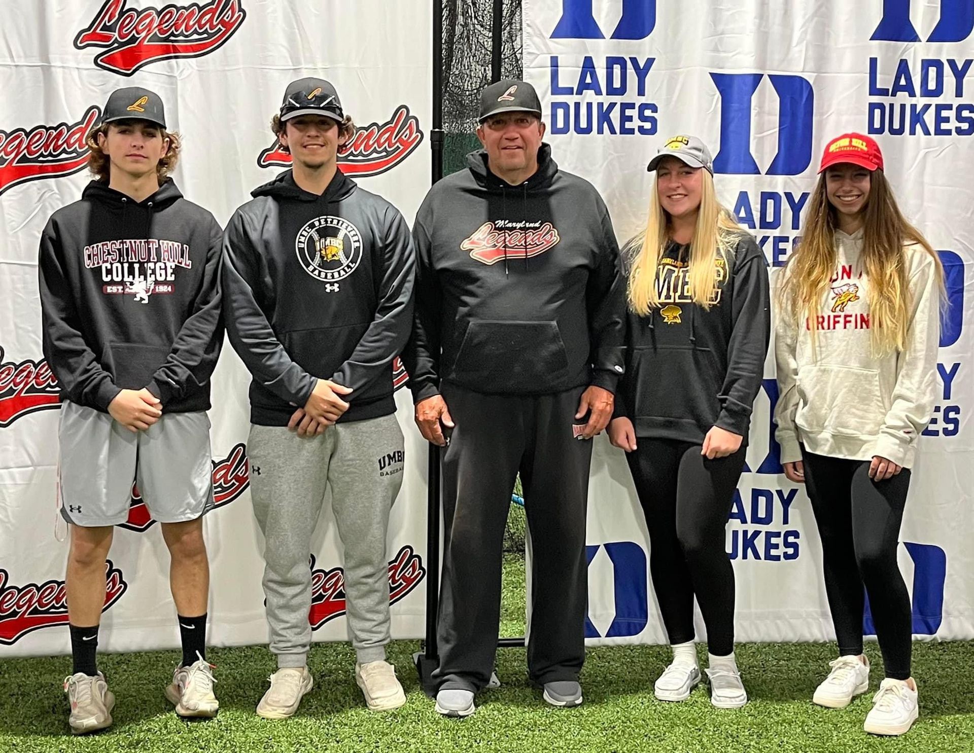 A group of people standing next to each other on a field — Elkton, MD — Maryland Legends Baseball