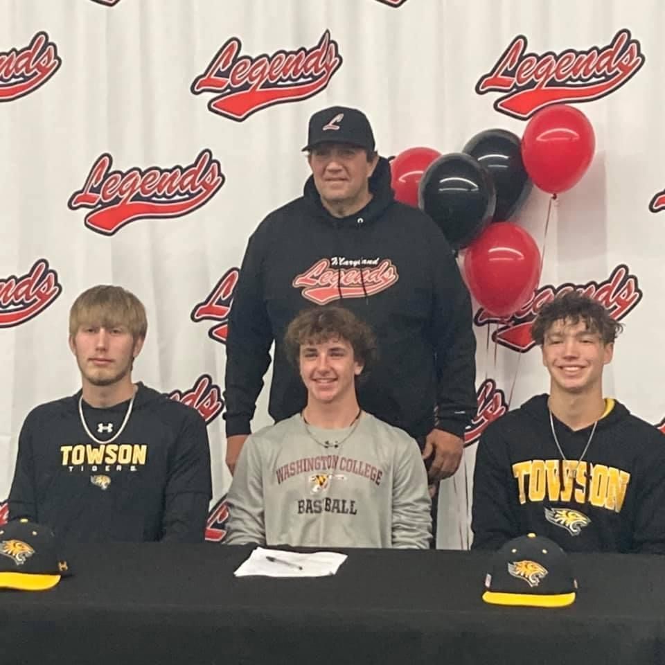 A group of boys are sitting at a table wearing Towson sweatshirts — Elkton, MD — Maryland Legends Baseball