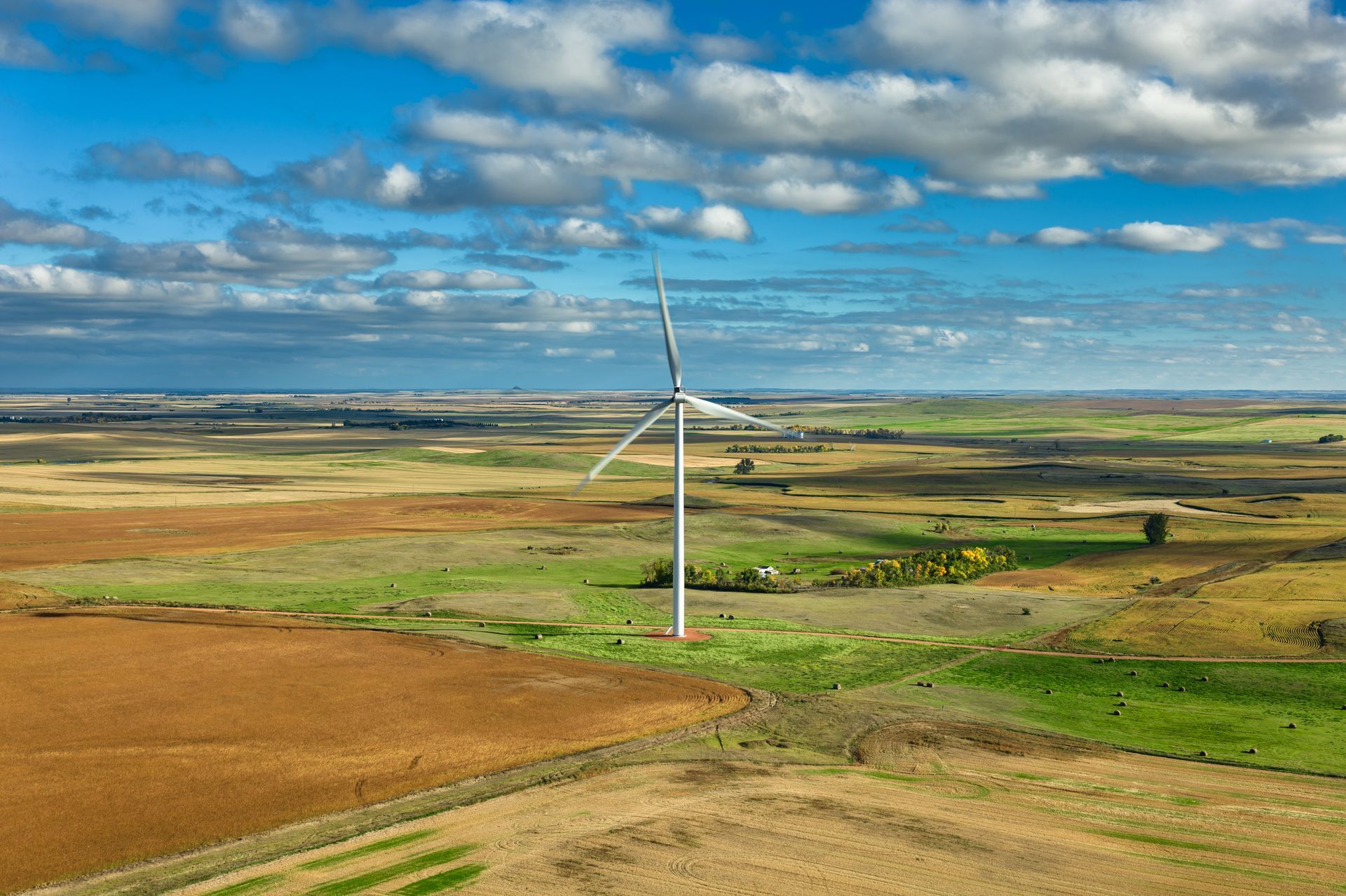 An Aerial View of a Wind Turbine in the Middle of a Field | Great Bend, KS | P&S Electric