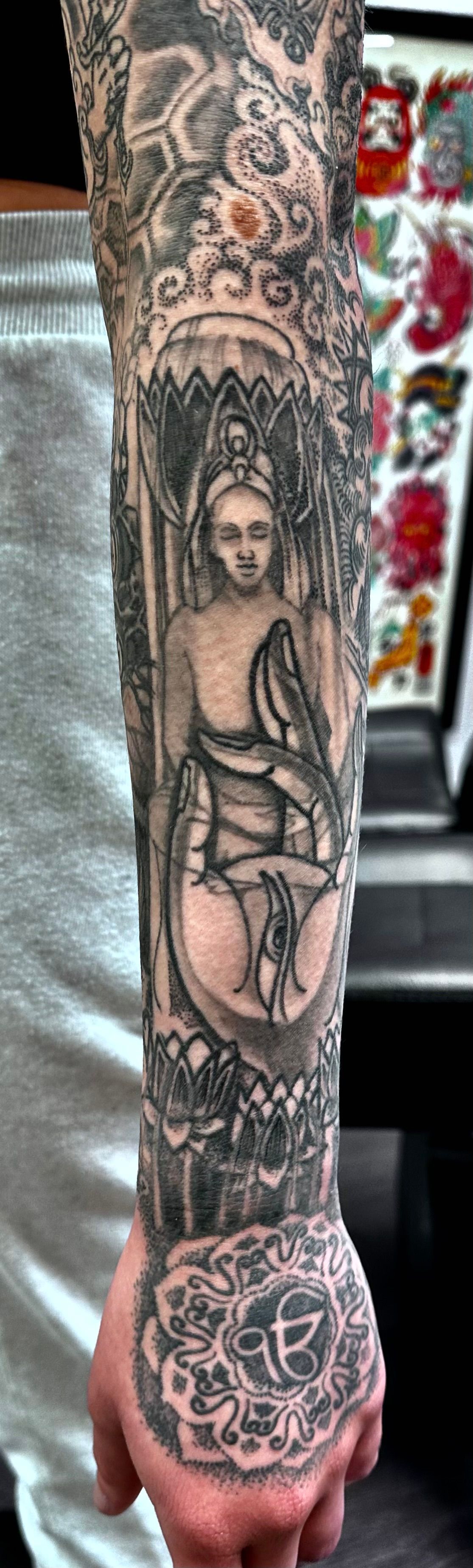 Buddha sleeve with Mandala tattoo