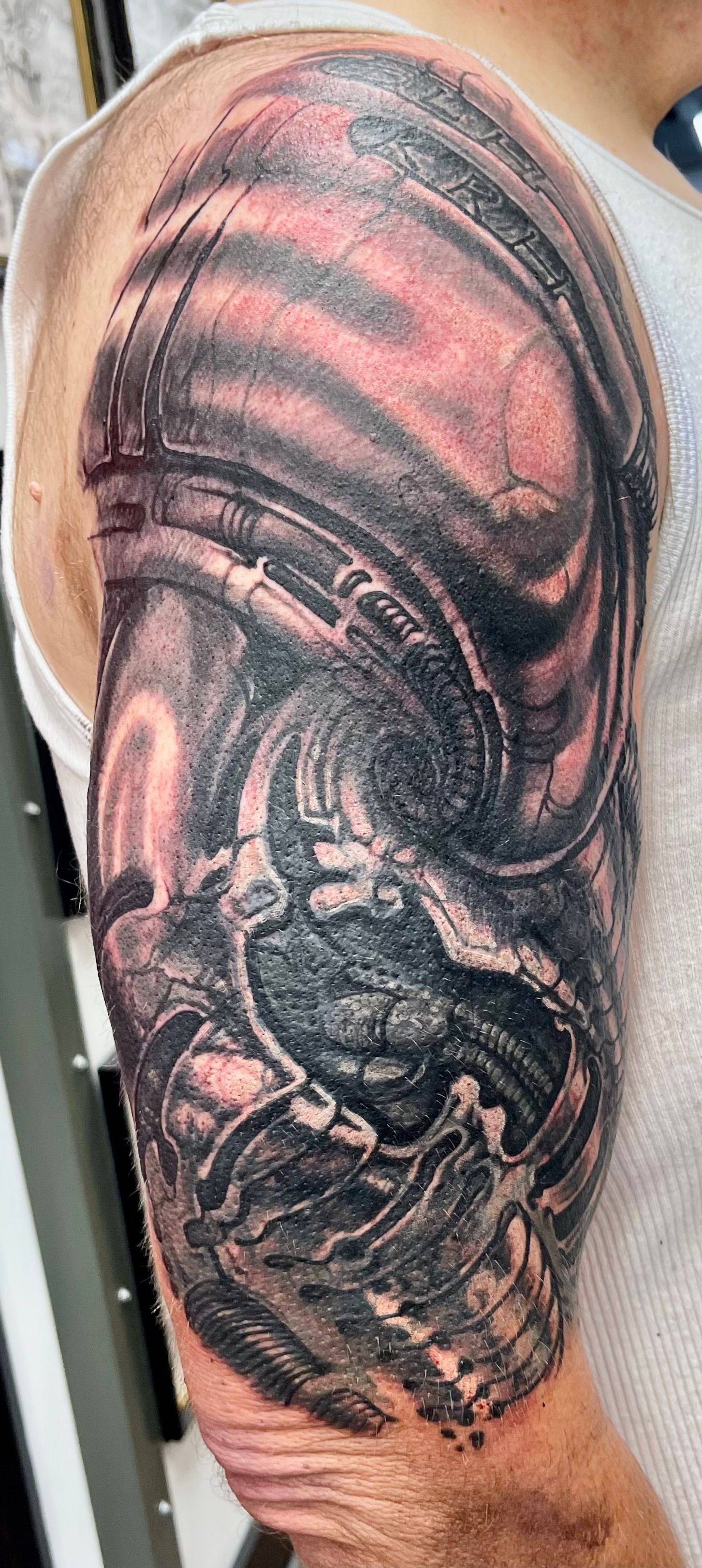 Biomechanical tattoo on shoulder