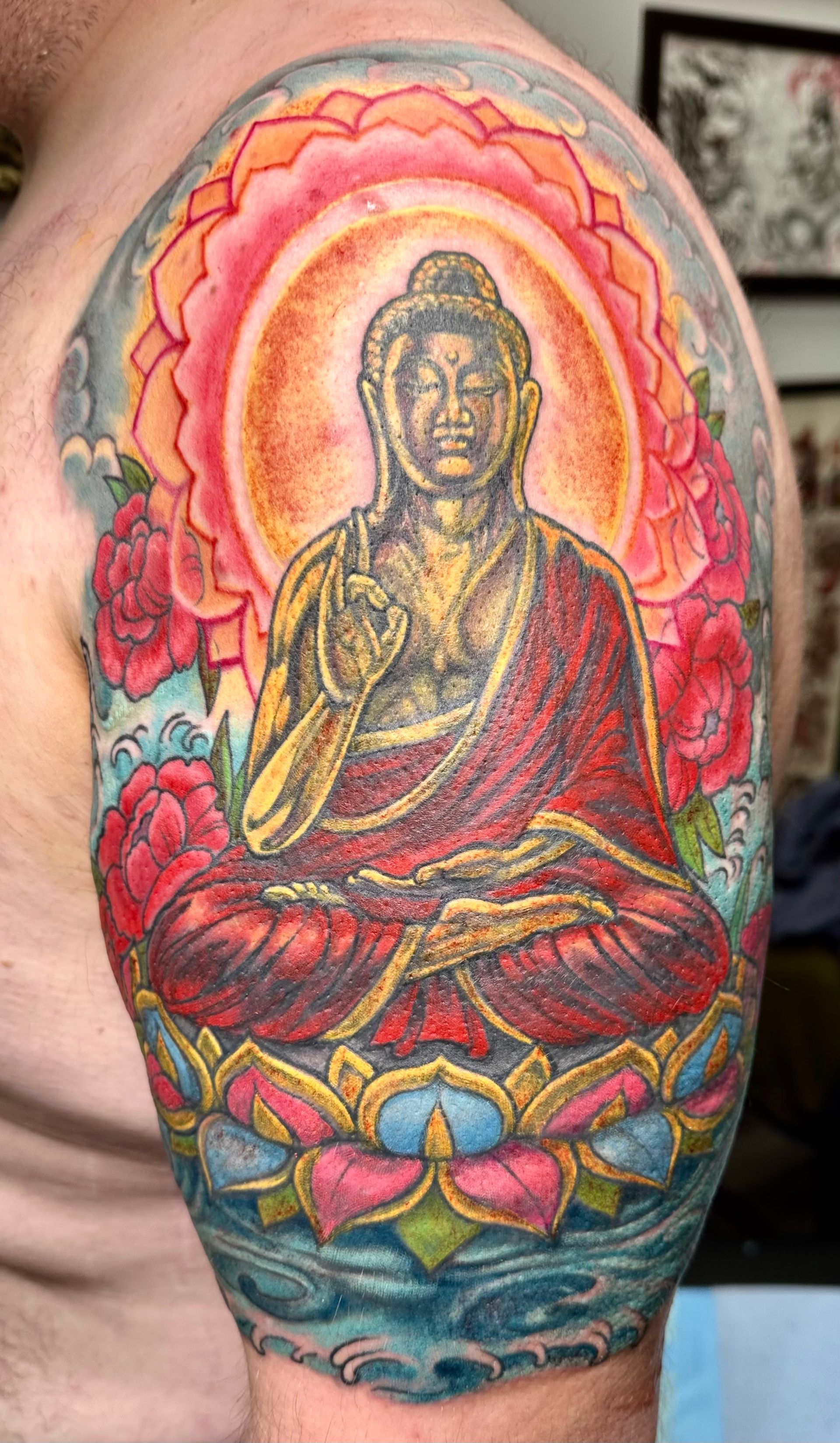 Colorful Buddha tattoo