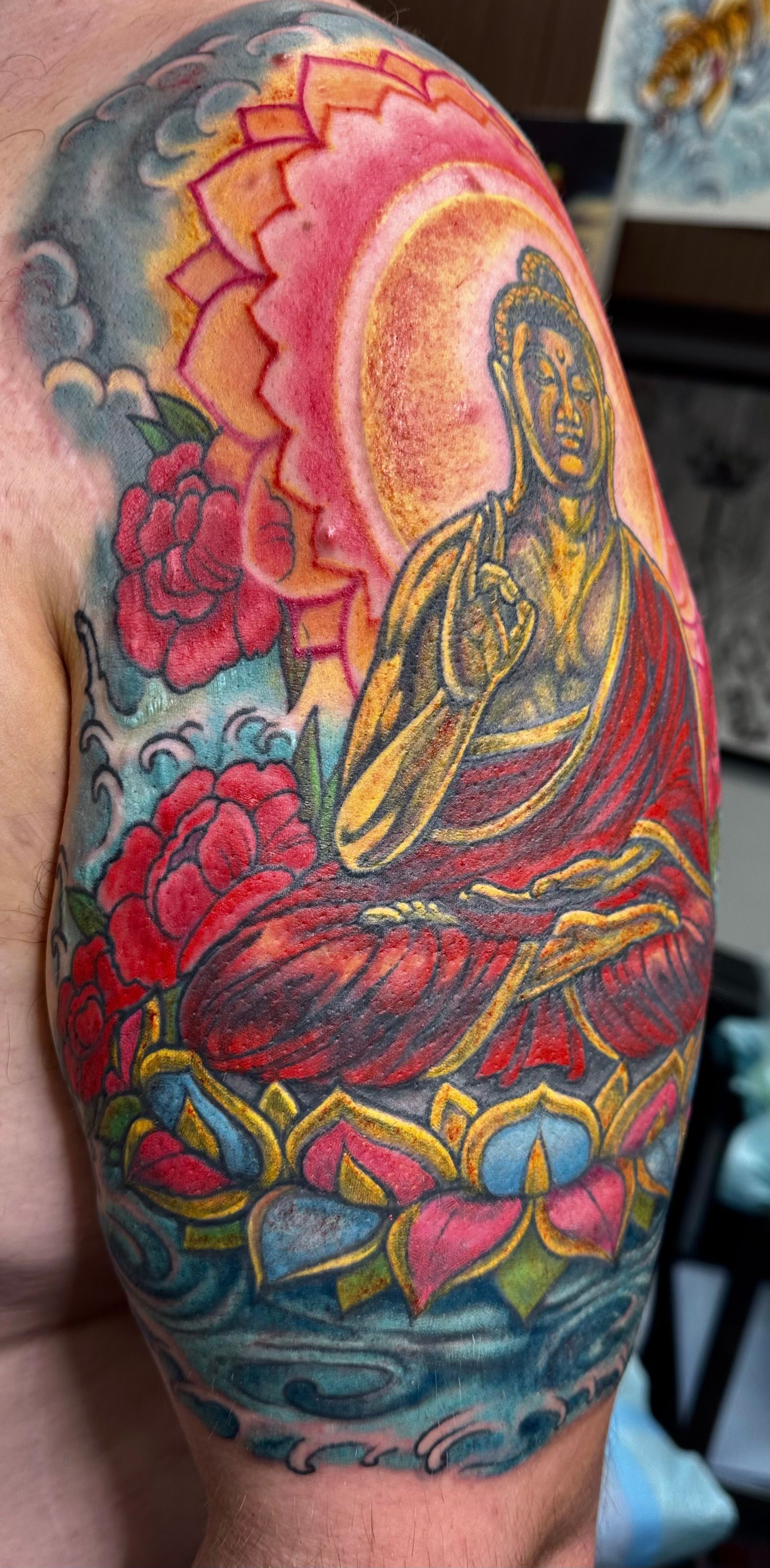 Colorful Buddha tattoo