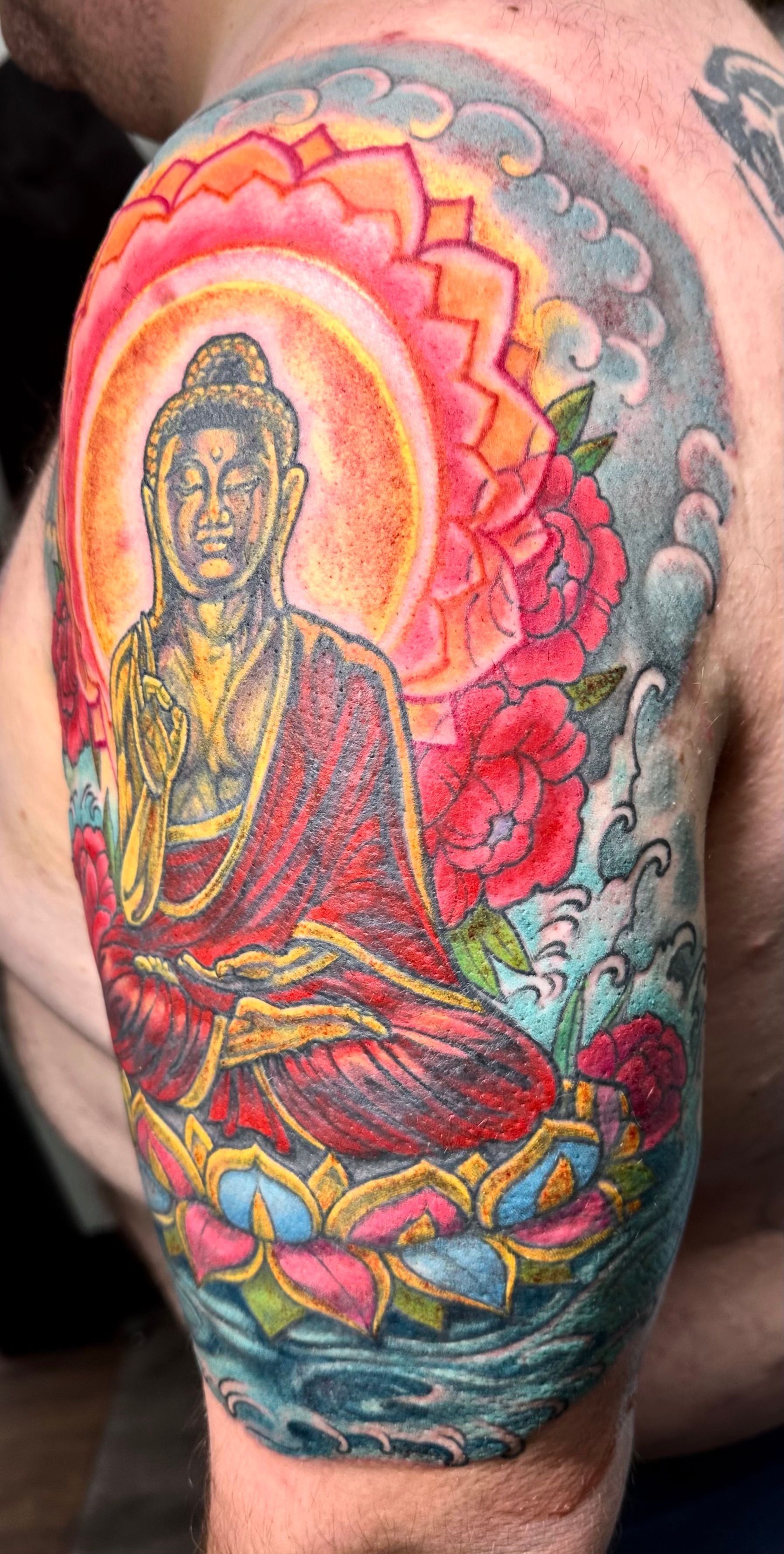 Colorful Buddha tattoo