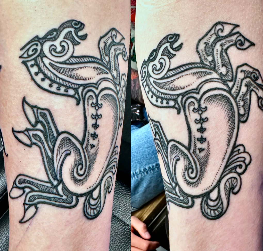 Cave painting with 8-legged horse tattoo