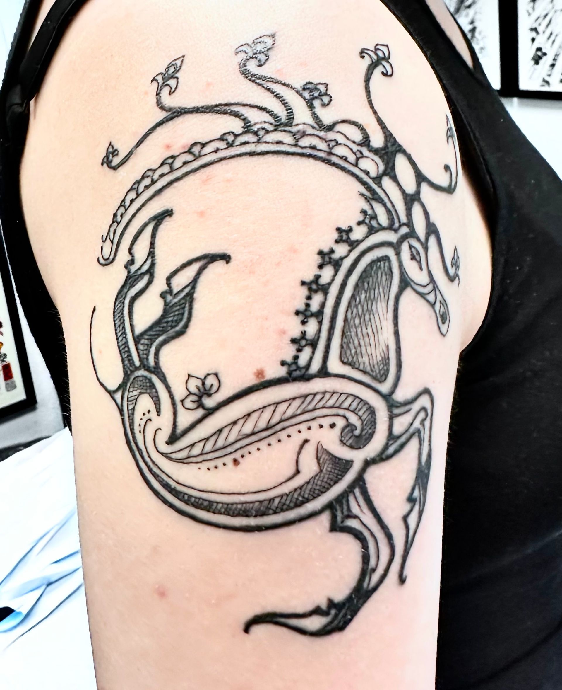 Cave painting with deer tattoo