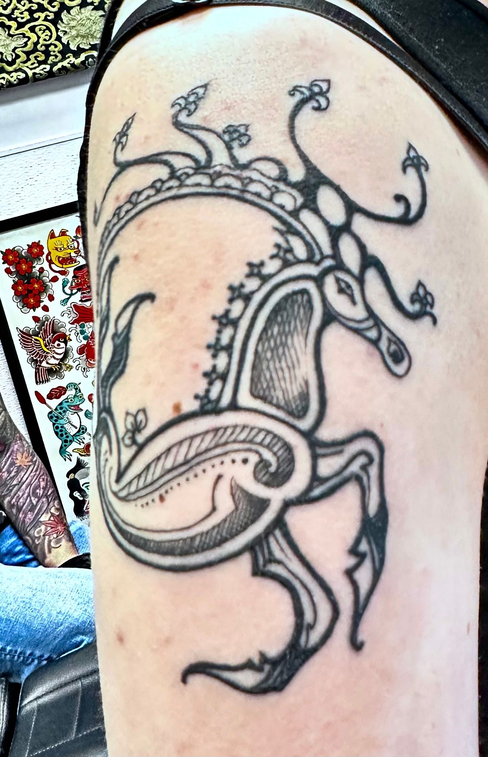 Cave painting with deer tattoo