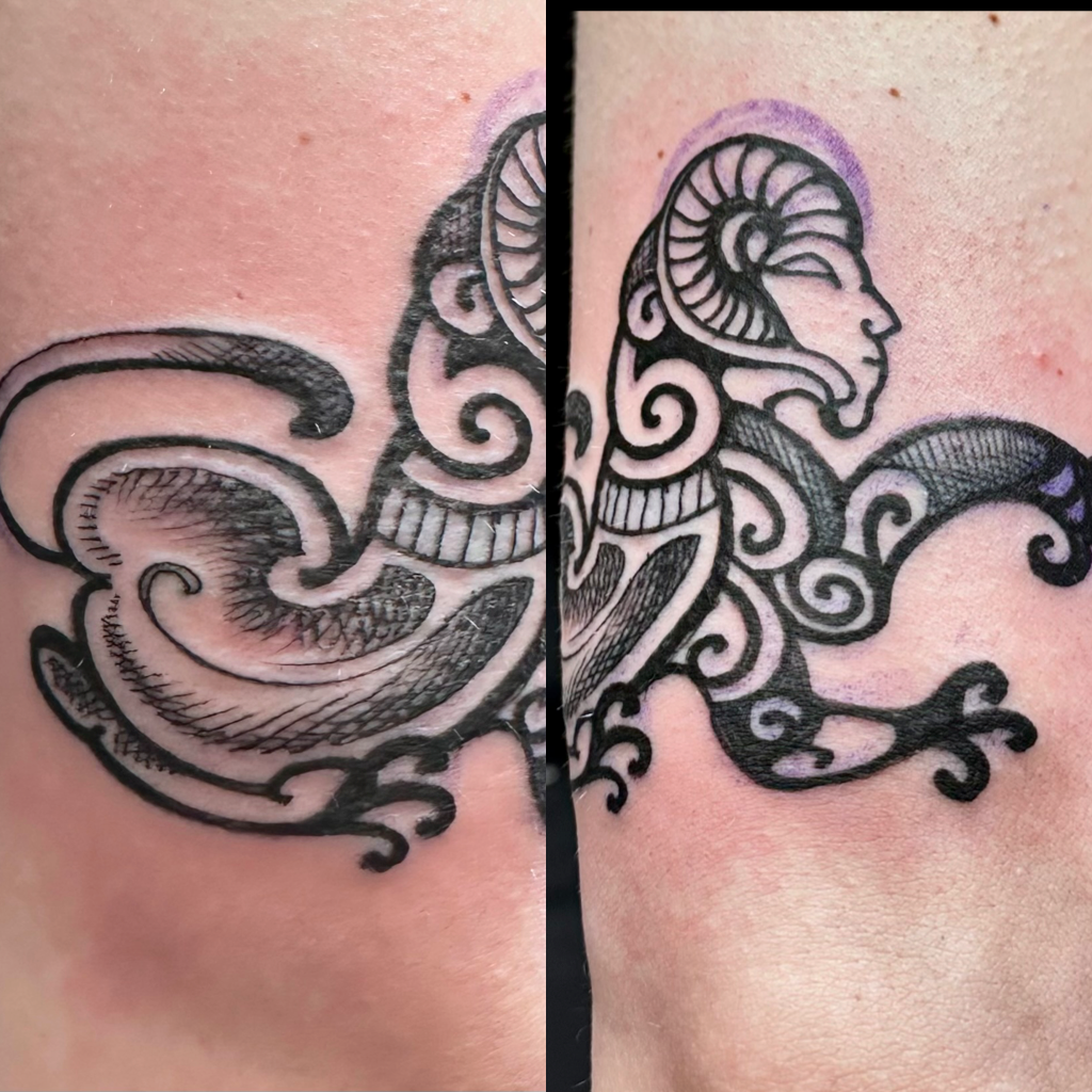 Cave painting with sphinx tattoo