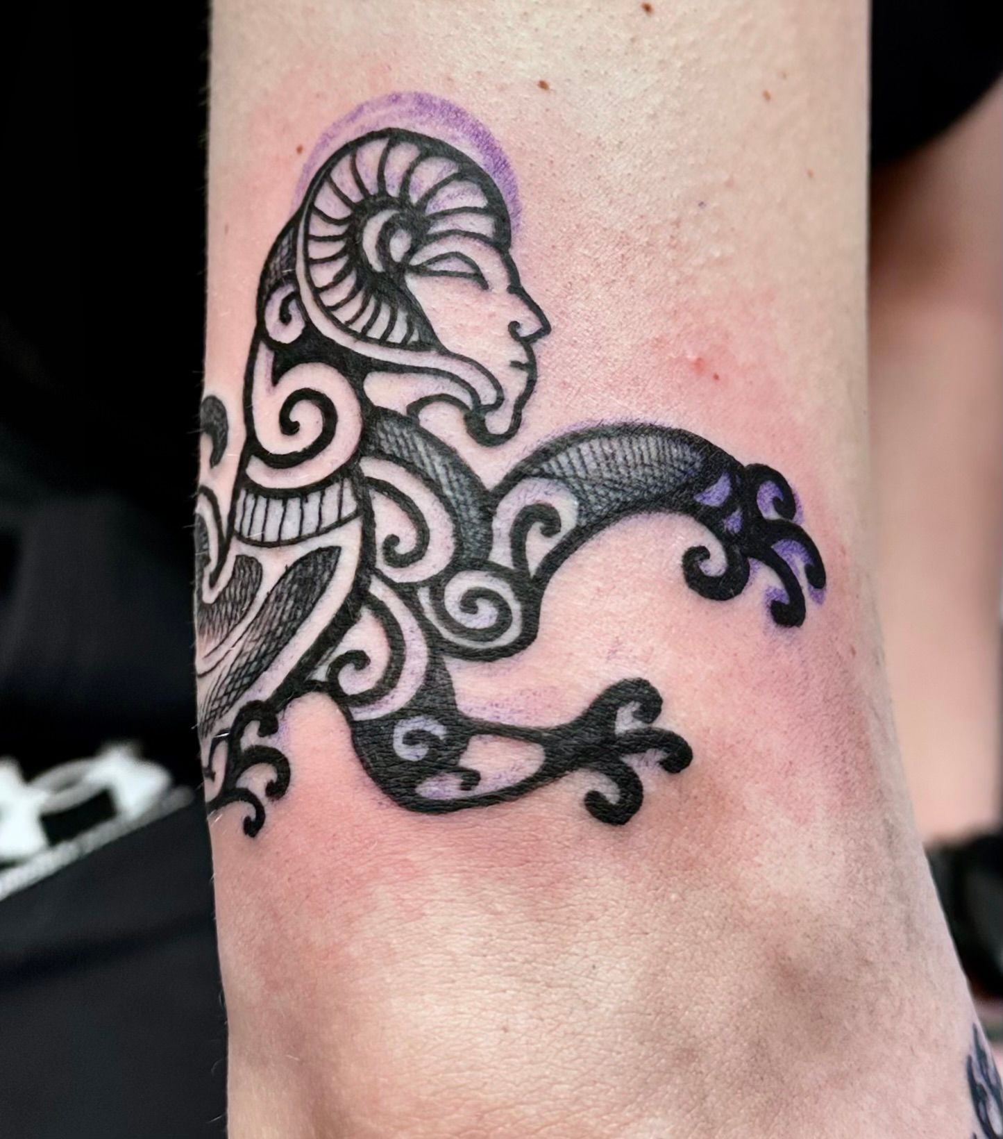 Cave painting with sphinx tattoo