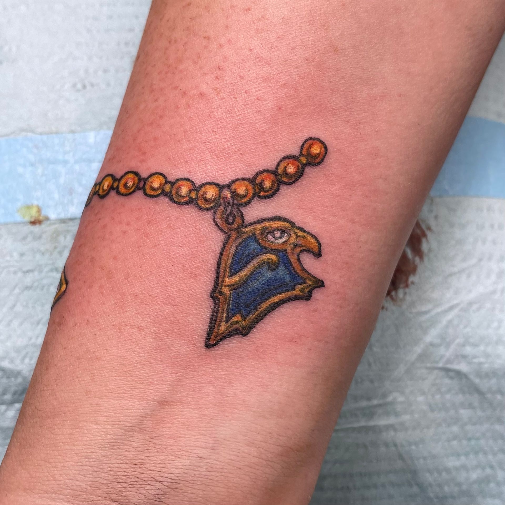 Charm Bracelet Tattoo