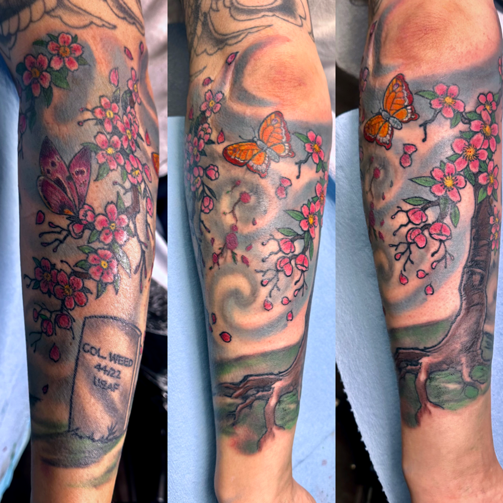 Cherry blossoms sleeve tattoo