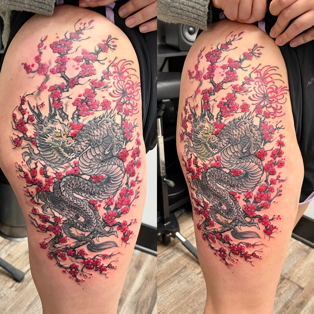 Dragon in red flowers large tattoo