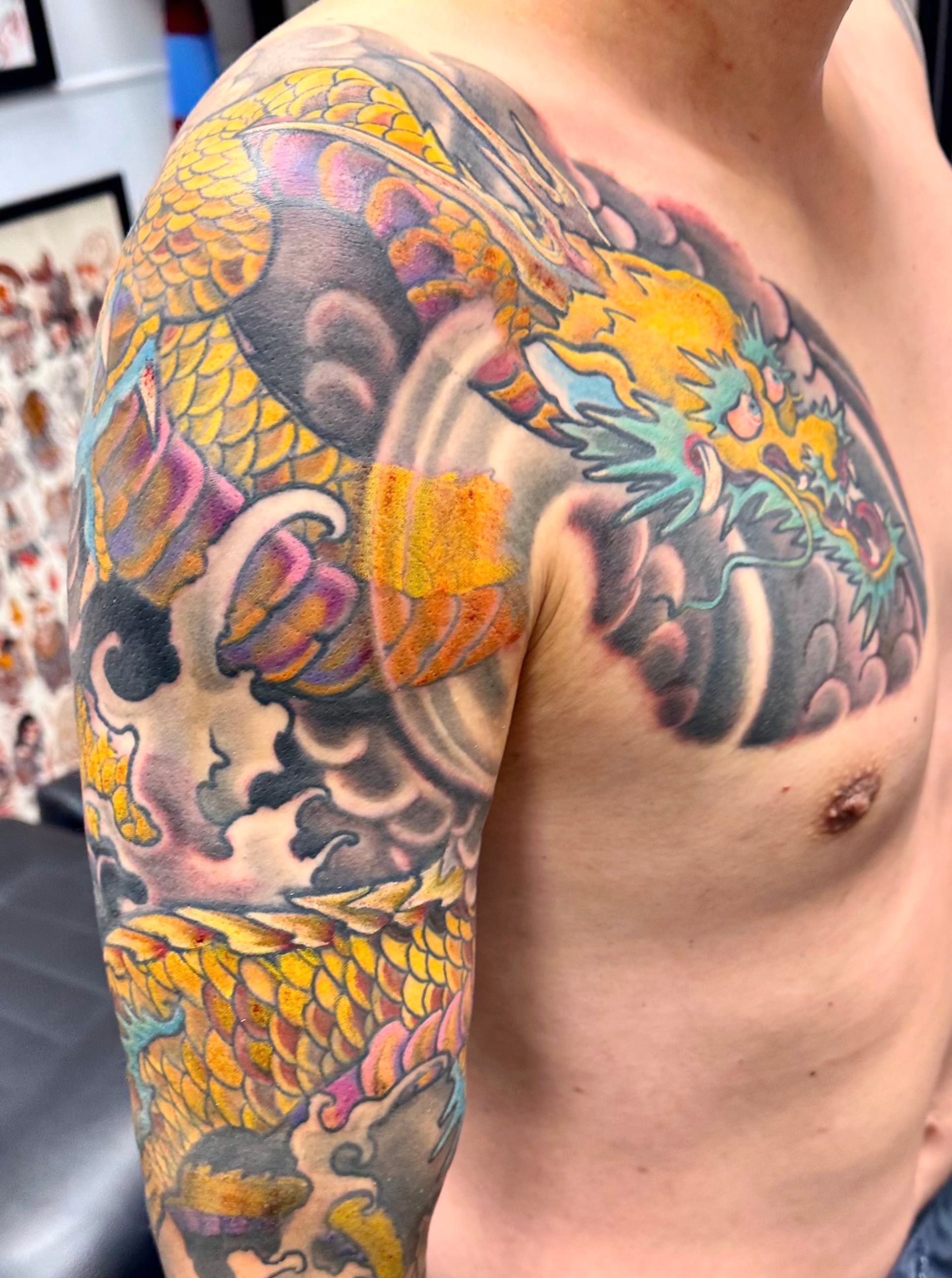 Dragon with Golden Waves Tattoo