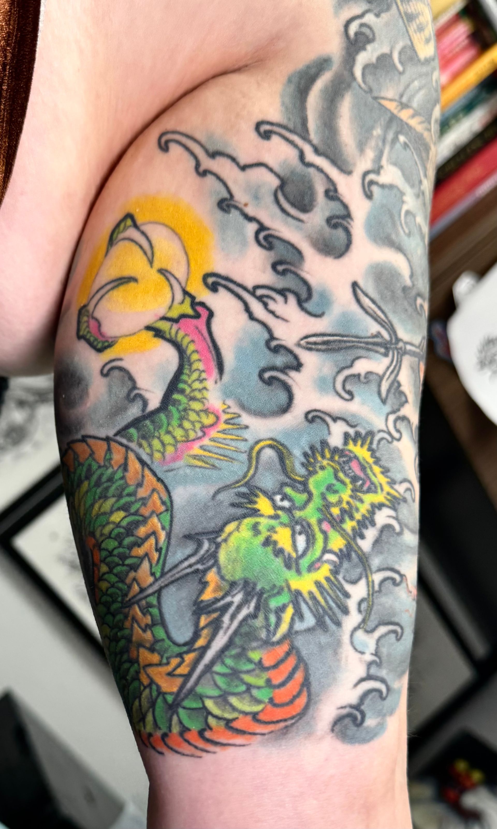 Green and Orange Dragon Tattoo