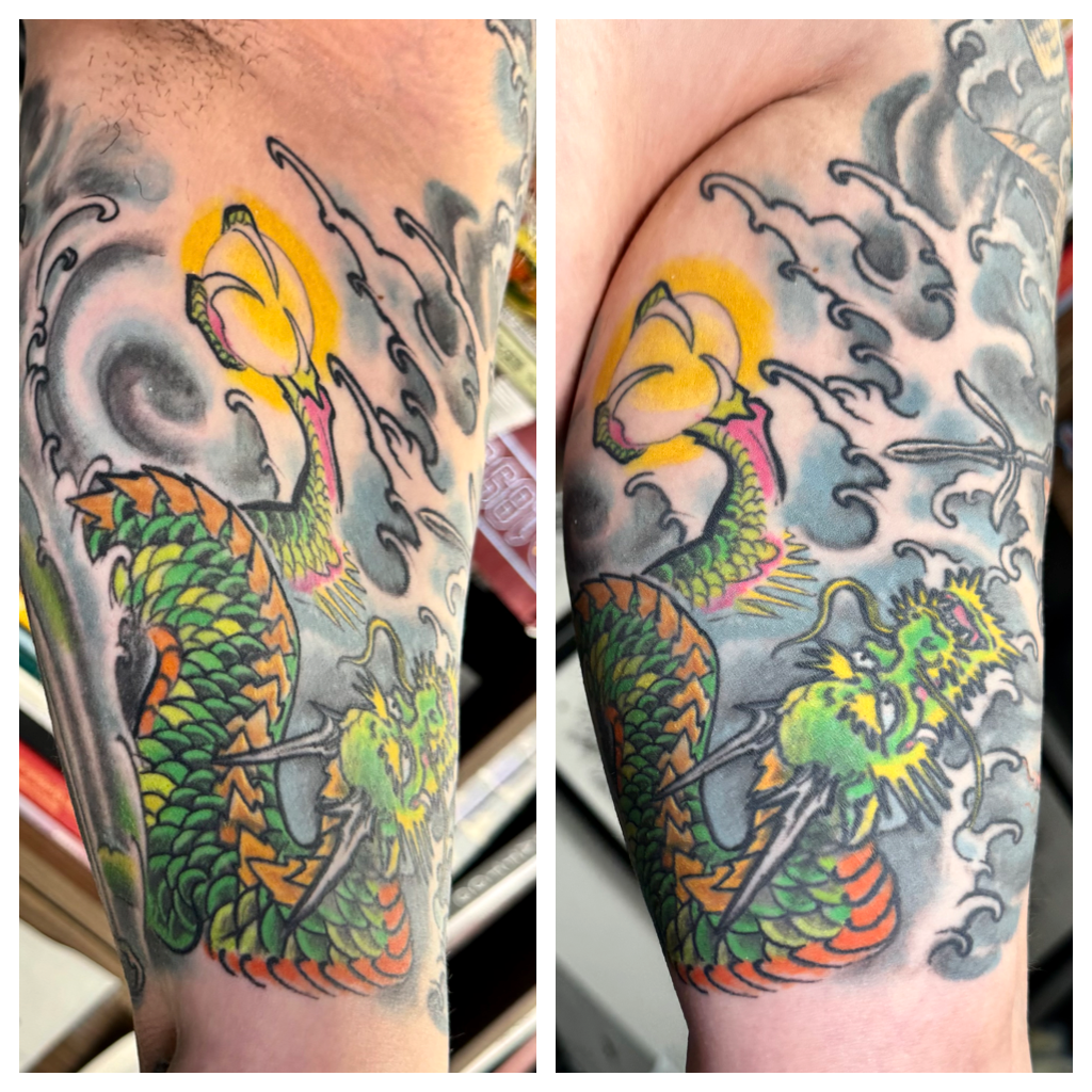 Green and orange dragon tattoo