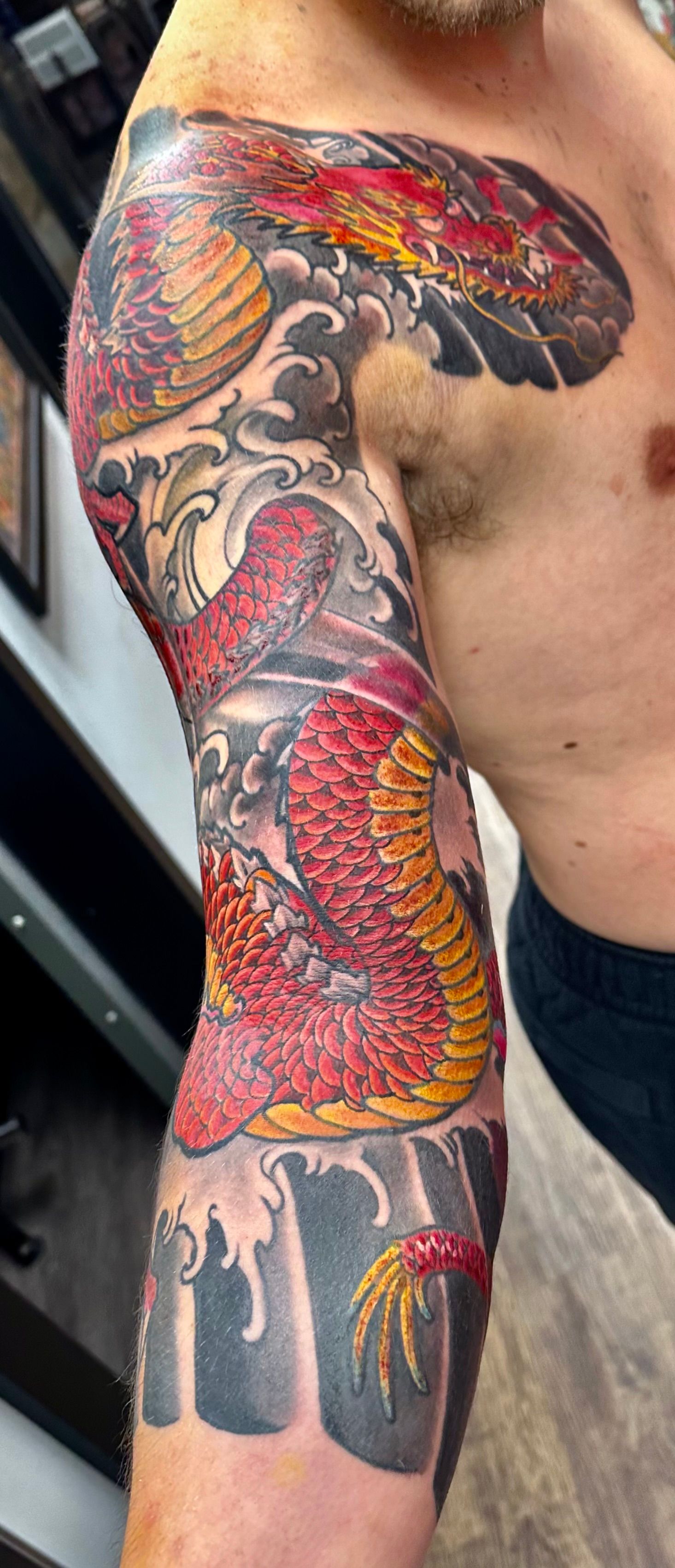 Dragon Red Waves Sleeve Tattoo