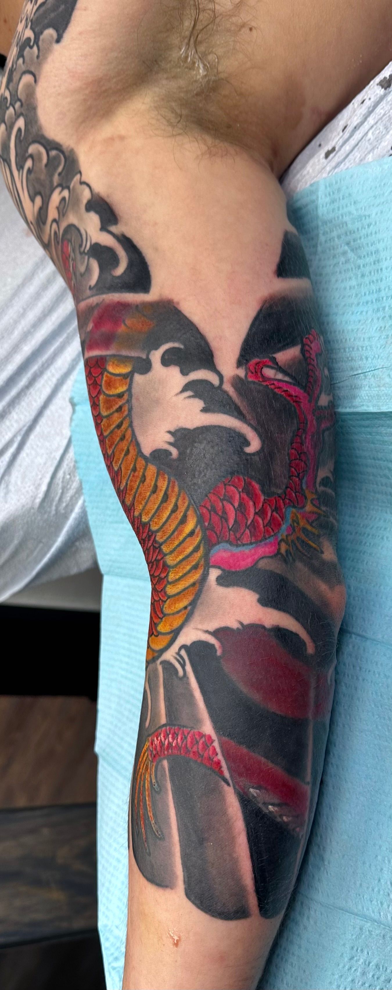 Dragon and Waves Tattoo