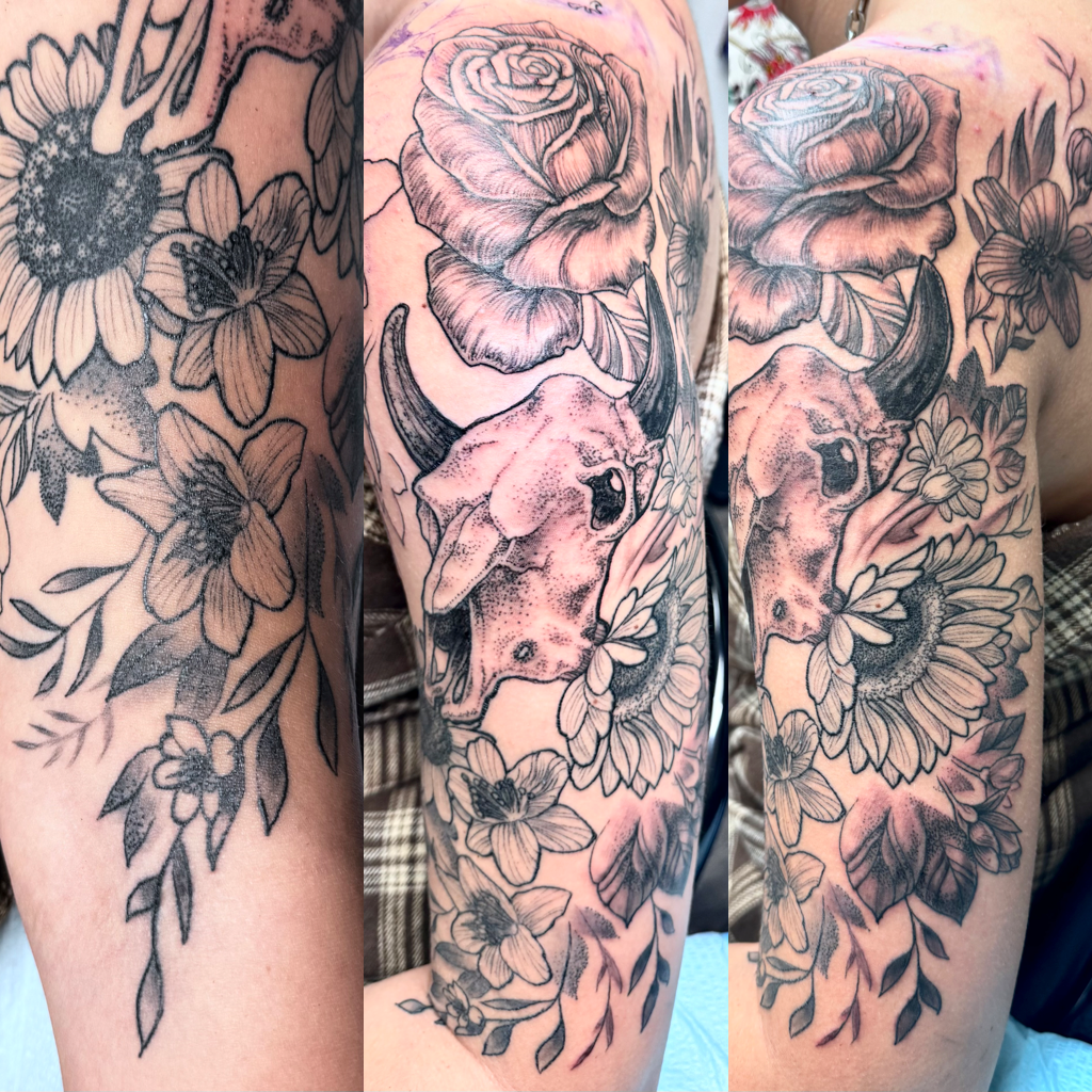 Flowers and cow skull tattoo