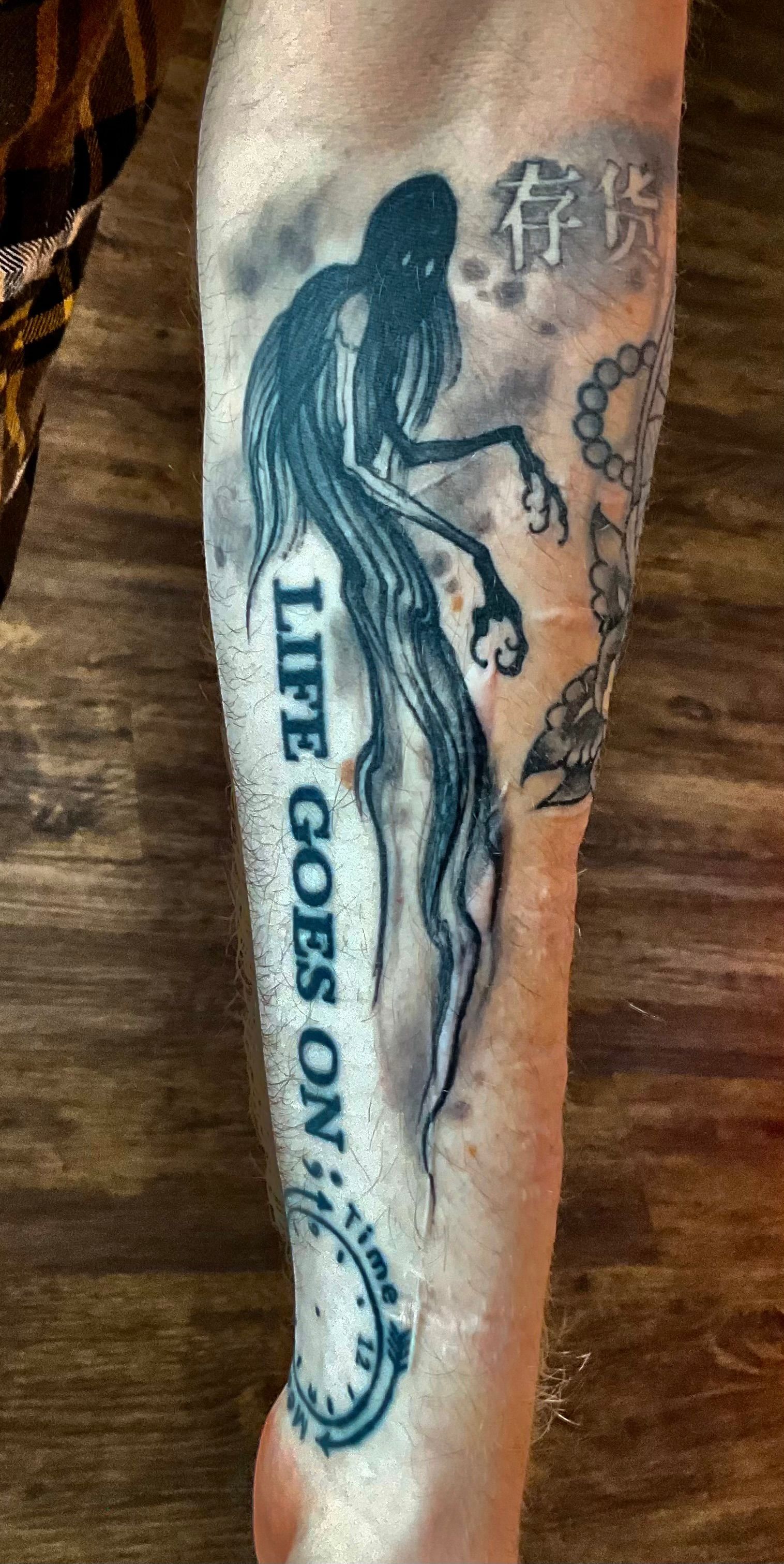 Ghost and Kanji tattoo