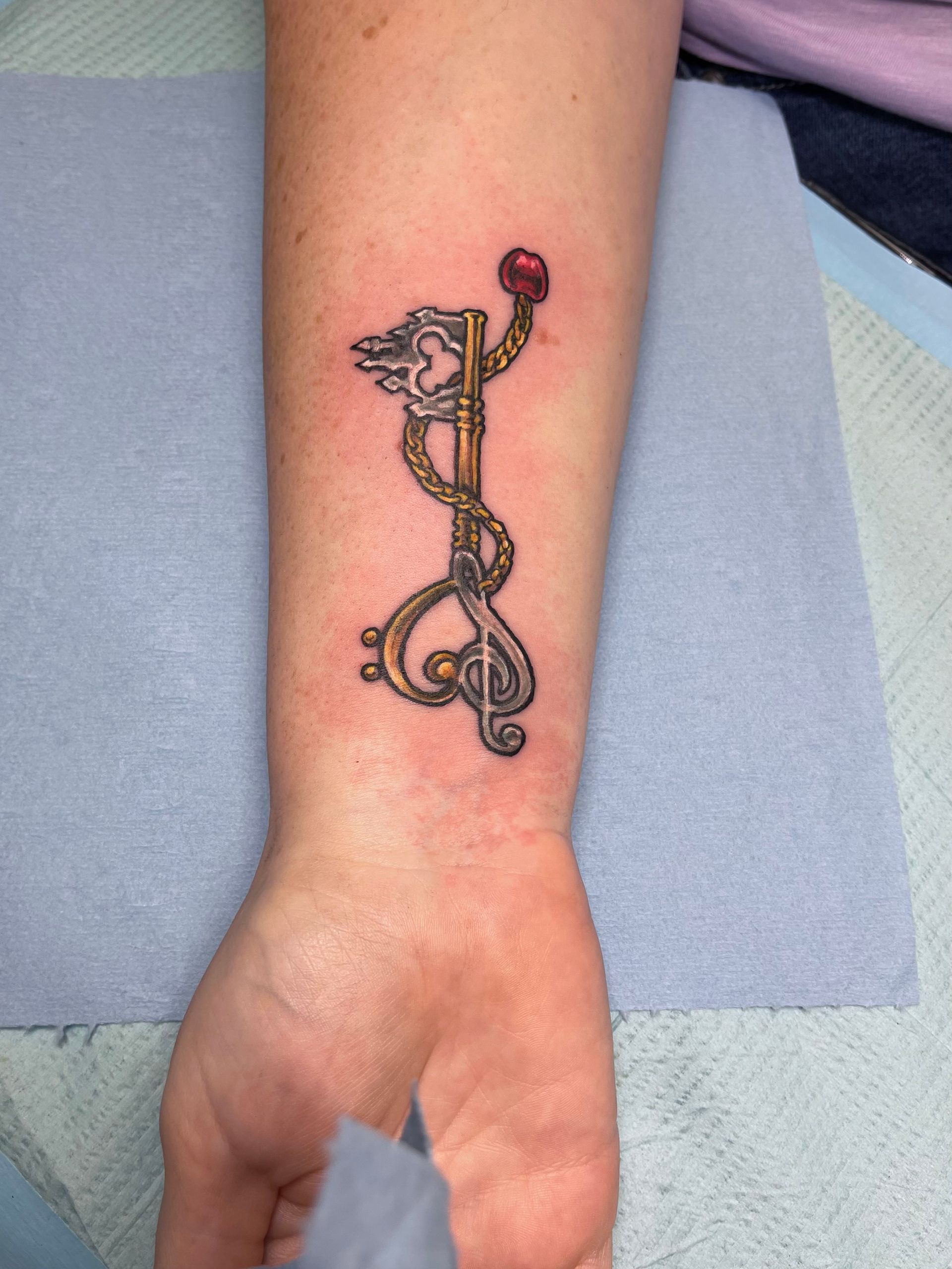 Golden key tattoo
