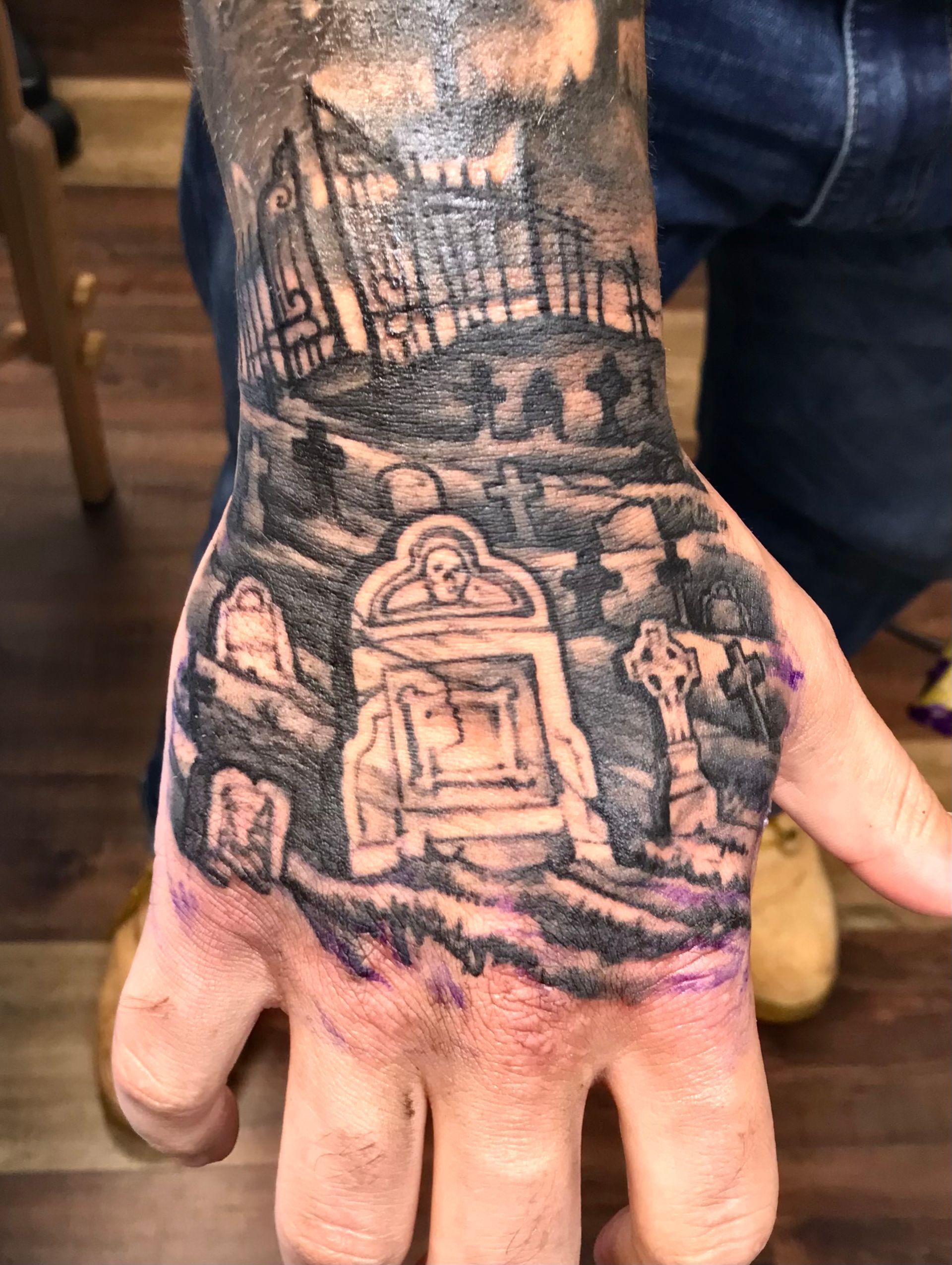 Graveyard tattoo on hand