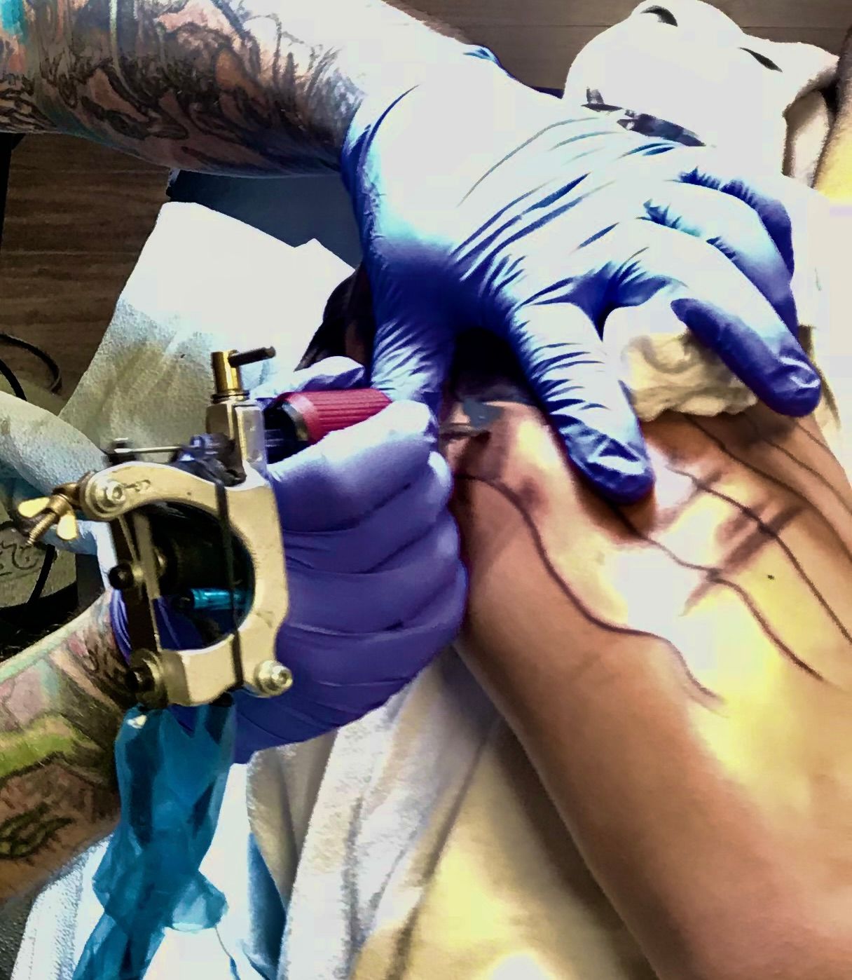 Matthew Wojciechowski tattooing