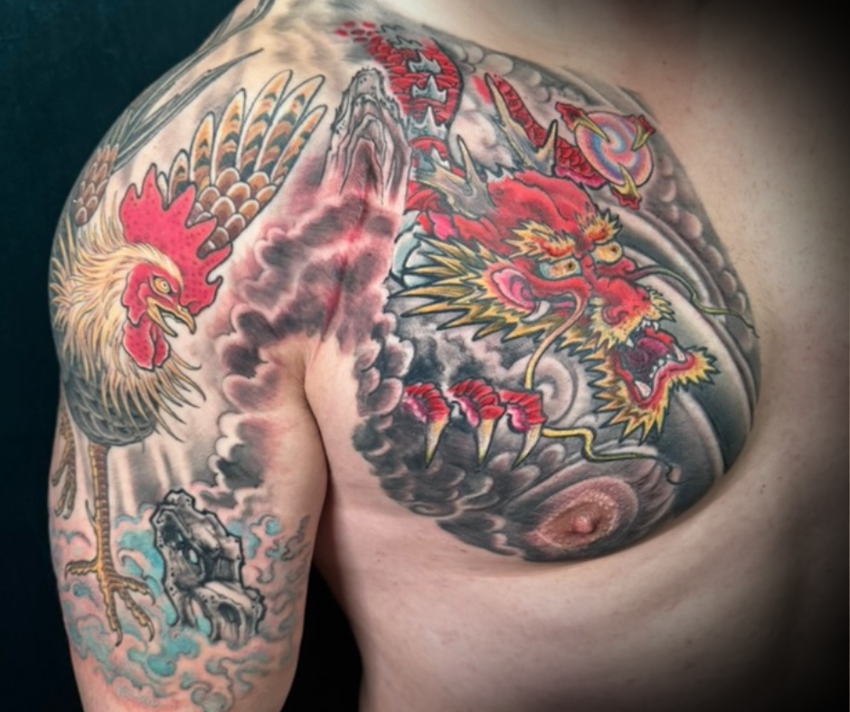 tattoo of a dragon and rooster