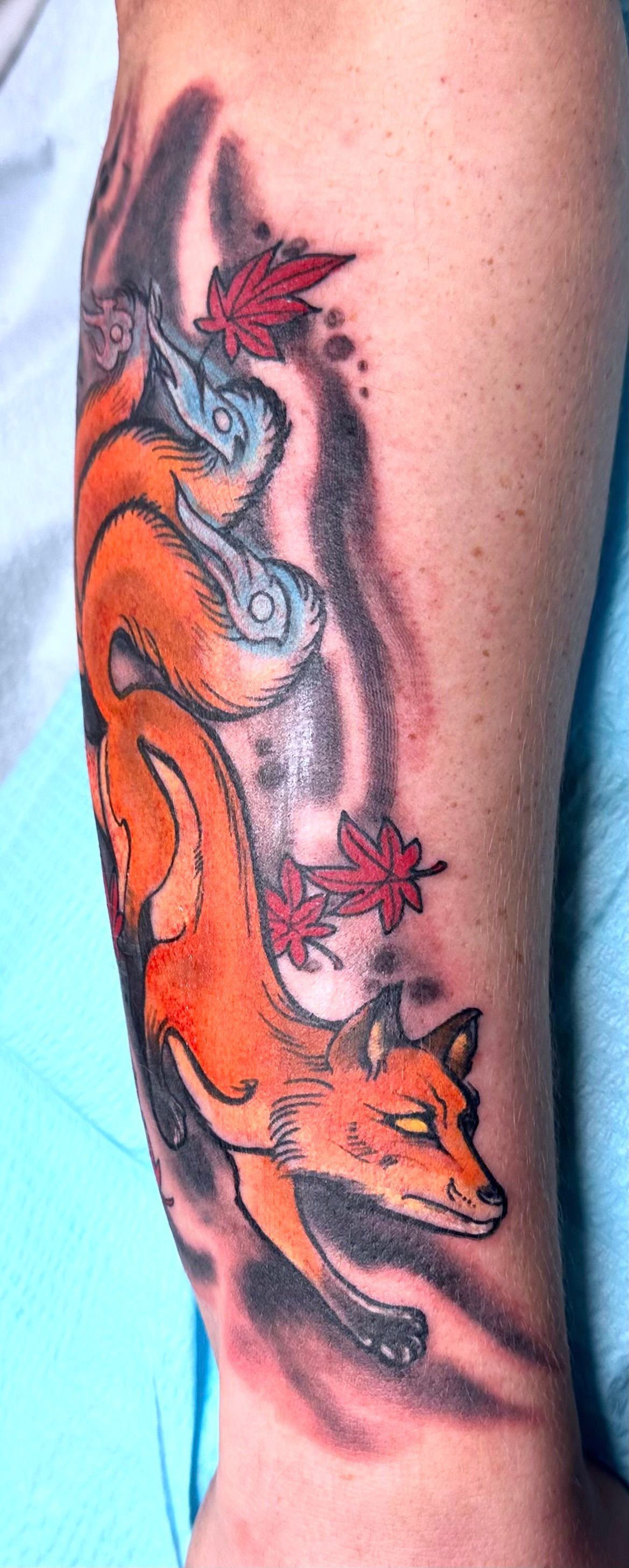 Kitsune tattoo on forearm