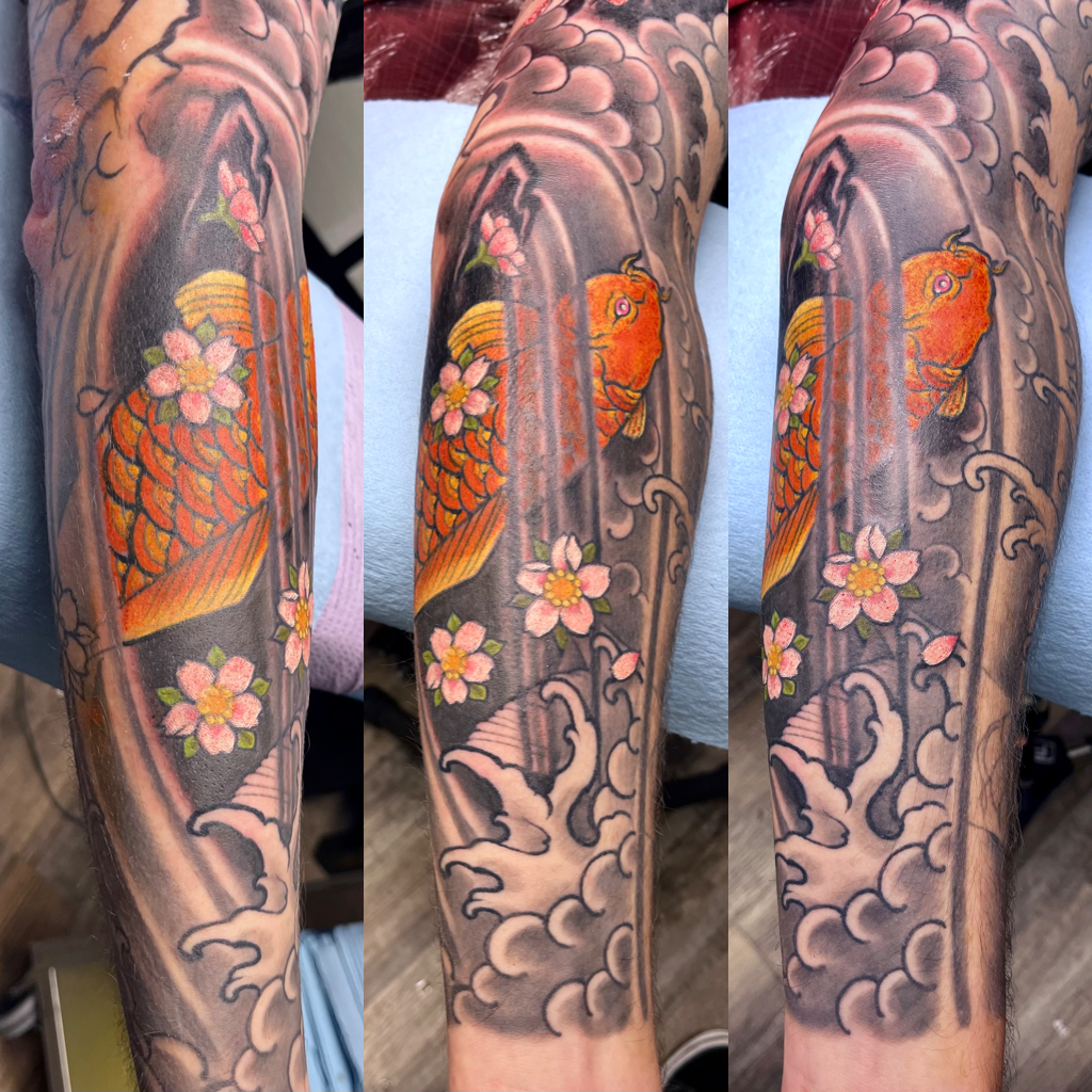 Orange Koi with white blossoms tattoo